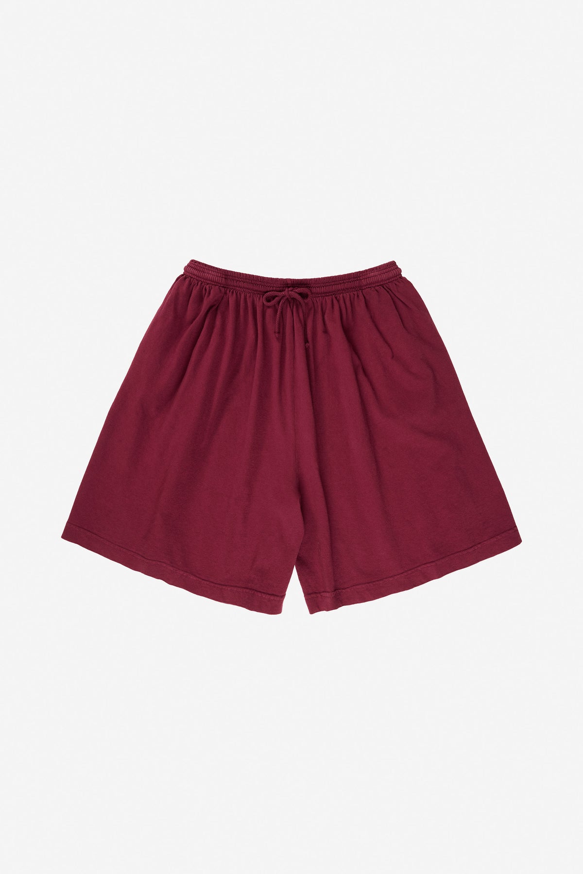 Long Tubular Shorts in Garnet – flat lay, no model