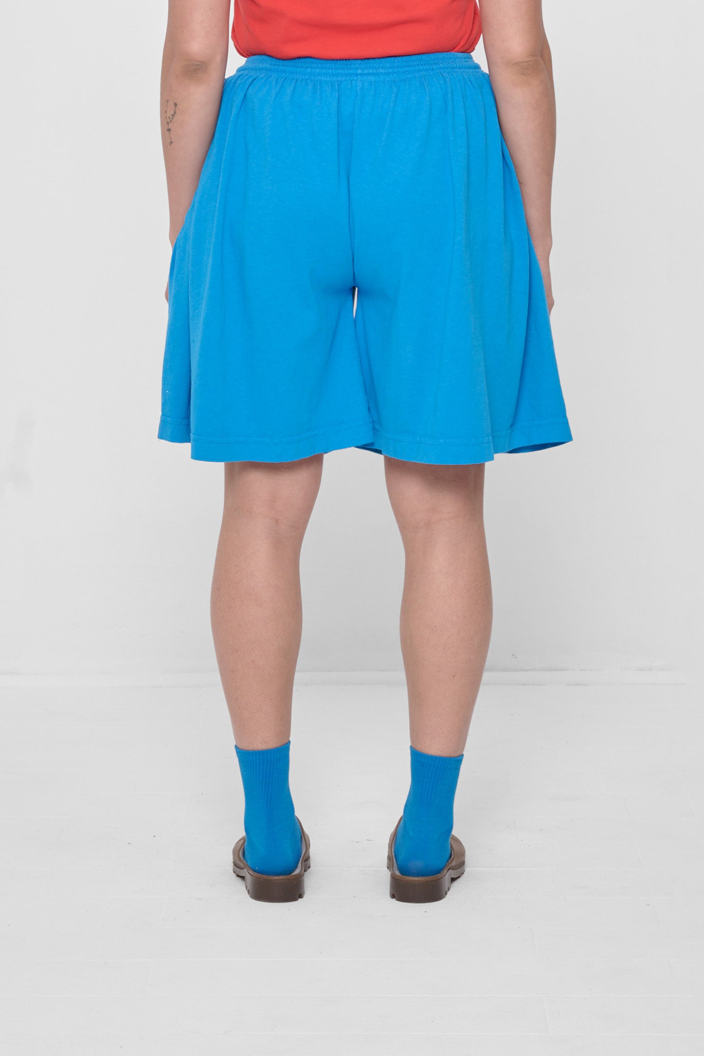 Back view showing drapey fit.