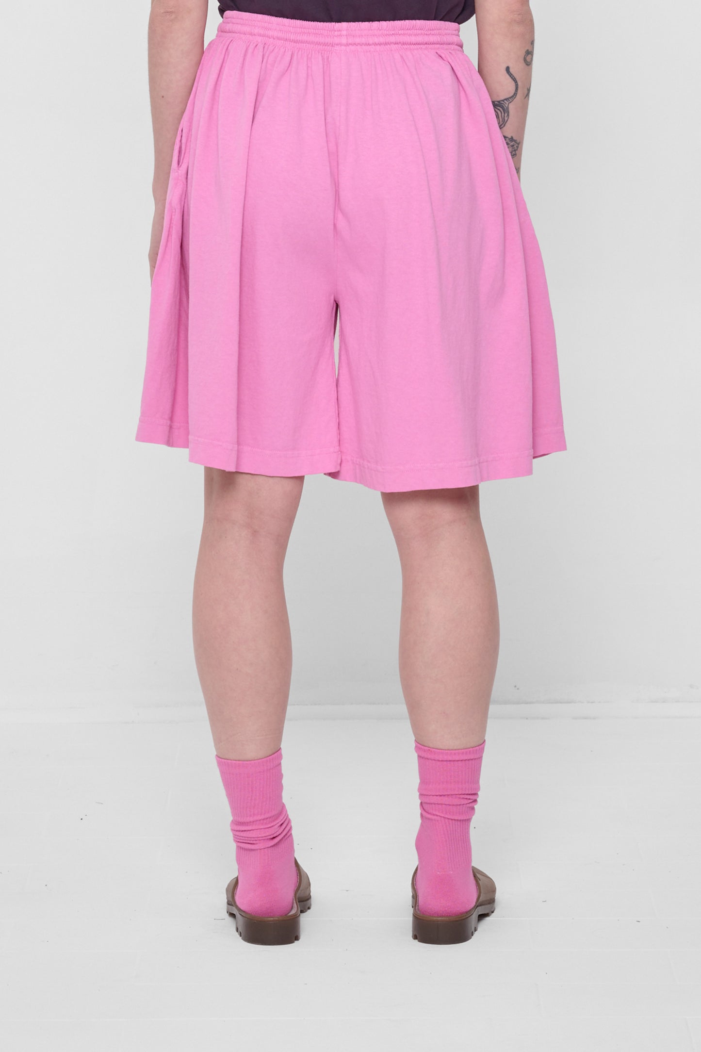 Back view showing drapey fit.