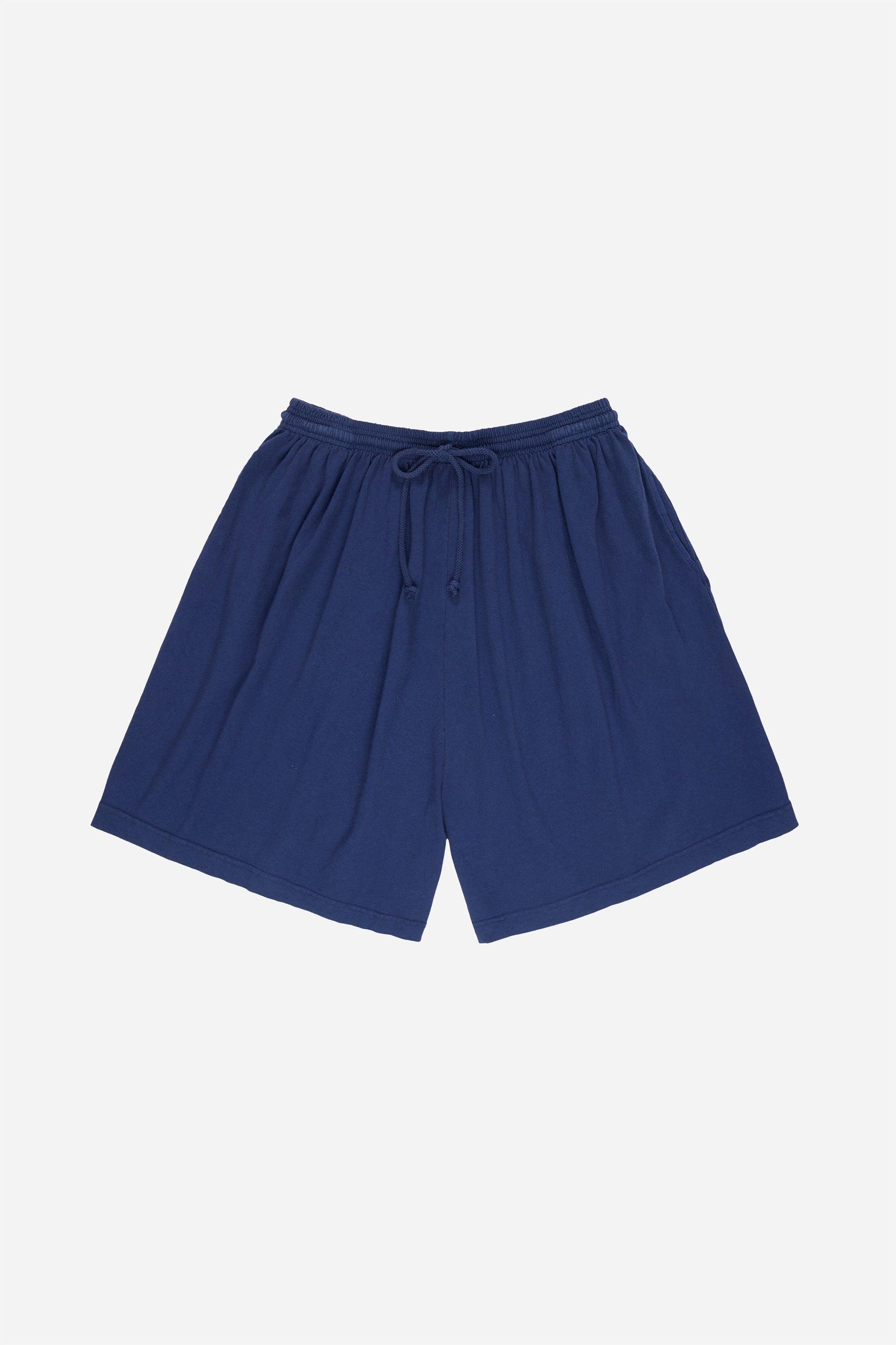 Flat lay of the Long Tubular Shorts in Washed Navy.