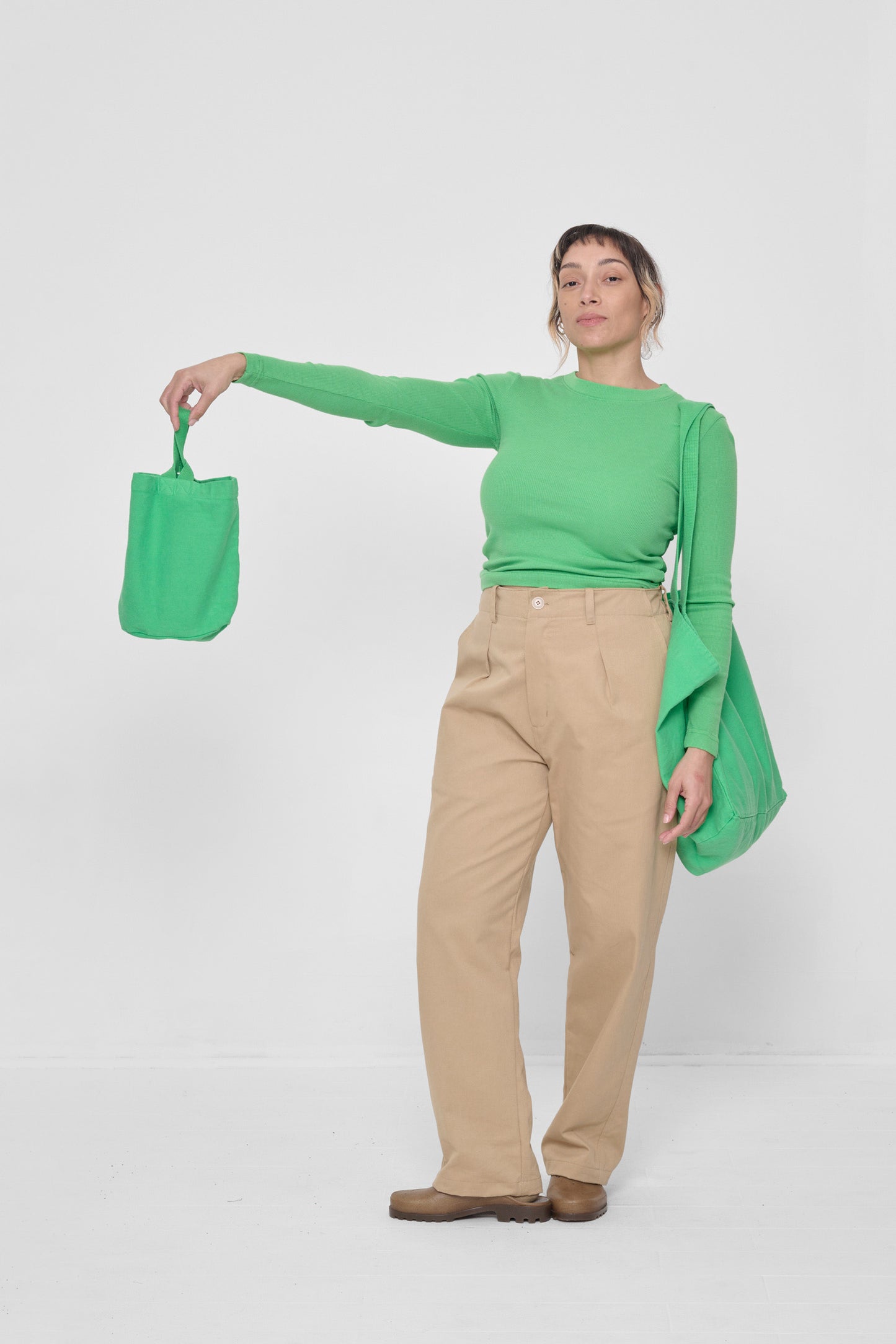 Held by a model who's wearing a matching Rib Long Sleeve and Big Tote.