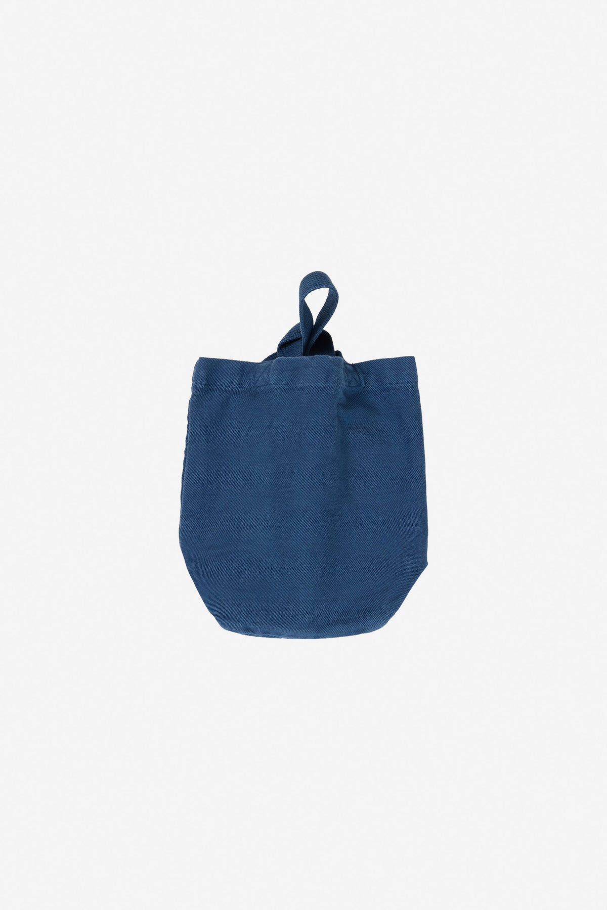 Loop Tote in Washed Navy – flat lay, straps looped, no model