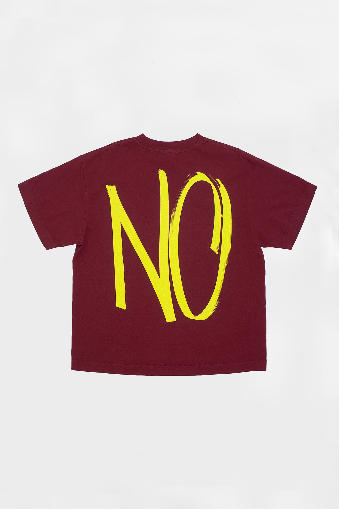Back flat lay showing the graphic and square-like boxy cut of the t-shirt.