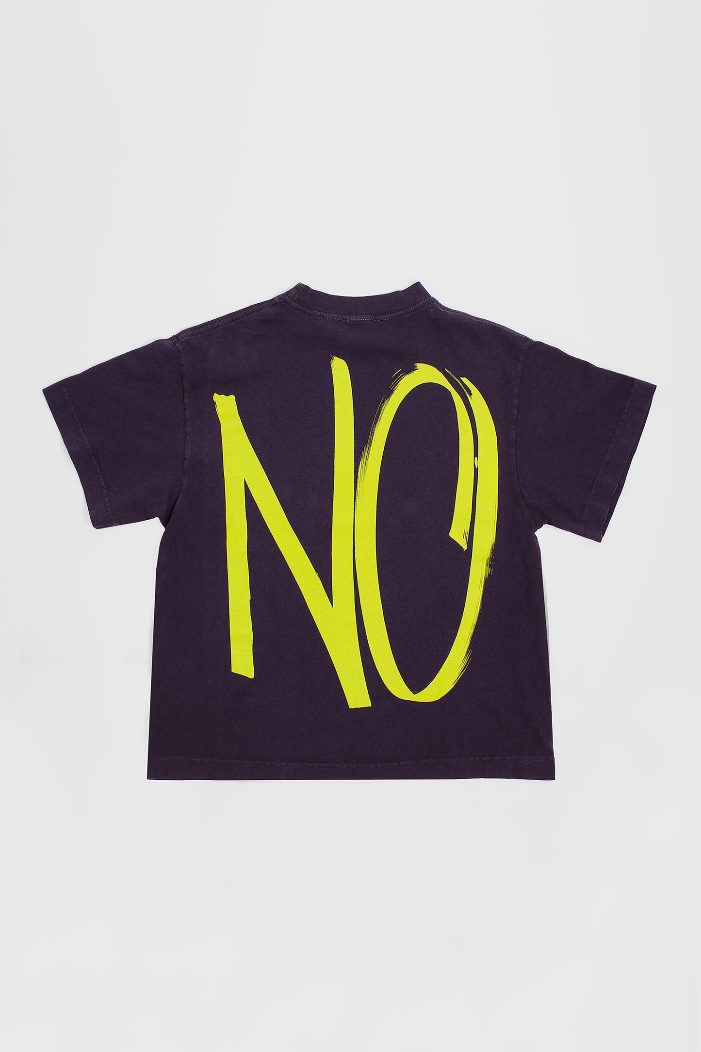 Back flat lay showing the graphic and square-like boxy cut of the t-shirt.