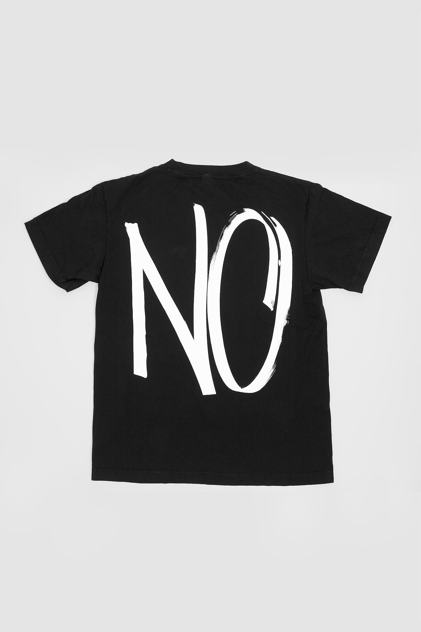 Flat lay of the back showing the graphic and straight rectangular cut of the body.