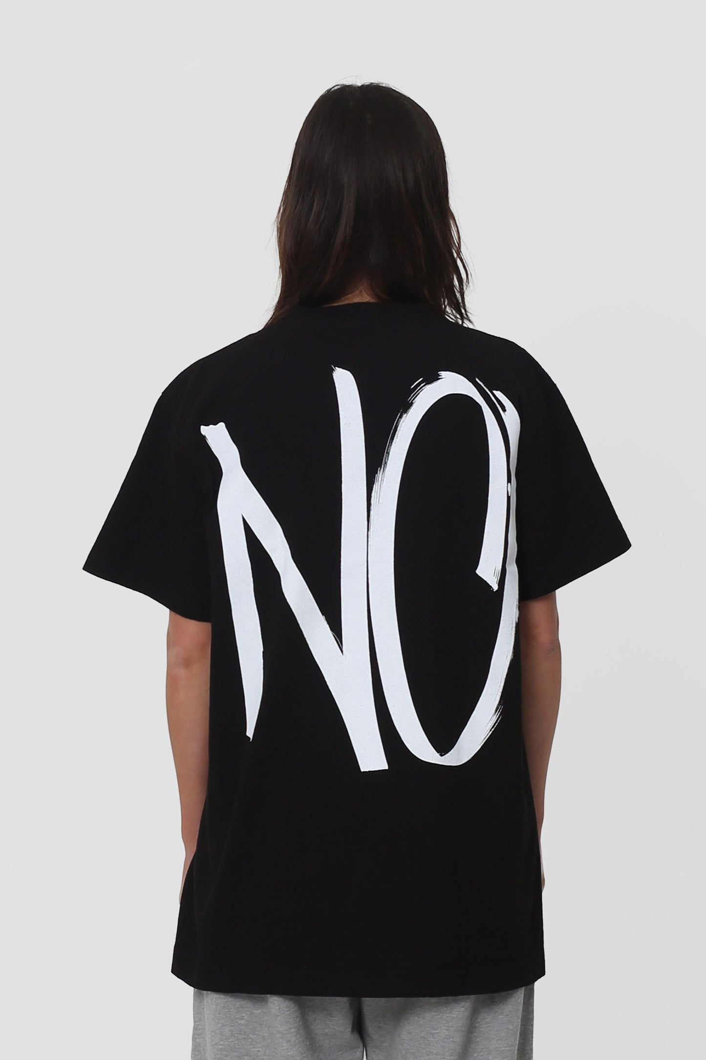 Back view showing "NO graphic and relaxed fit throughout