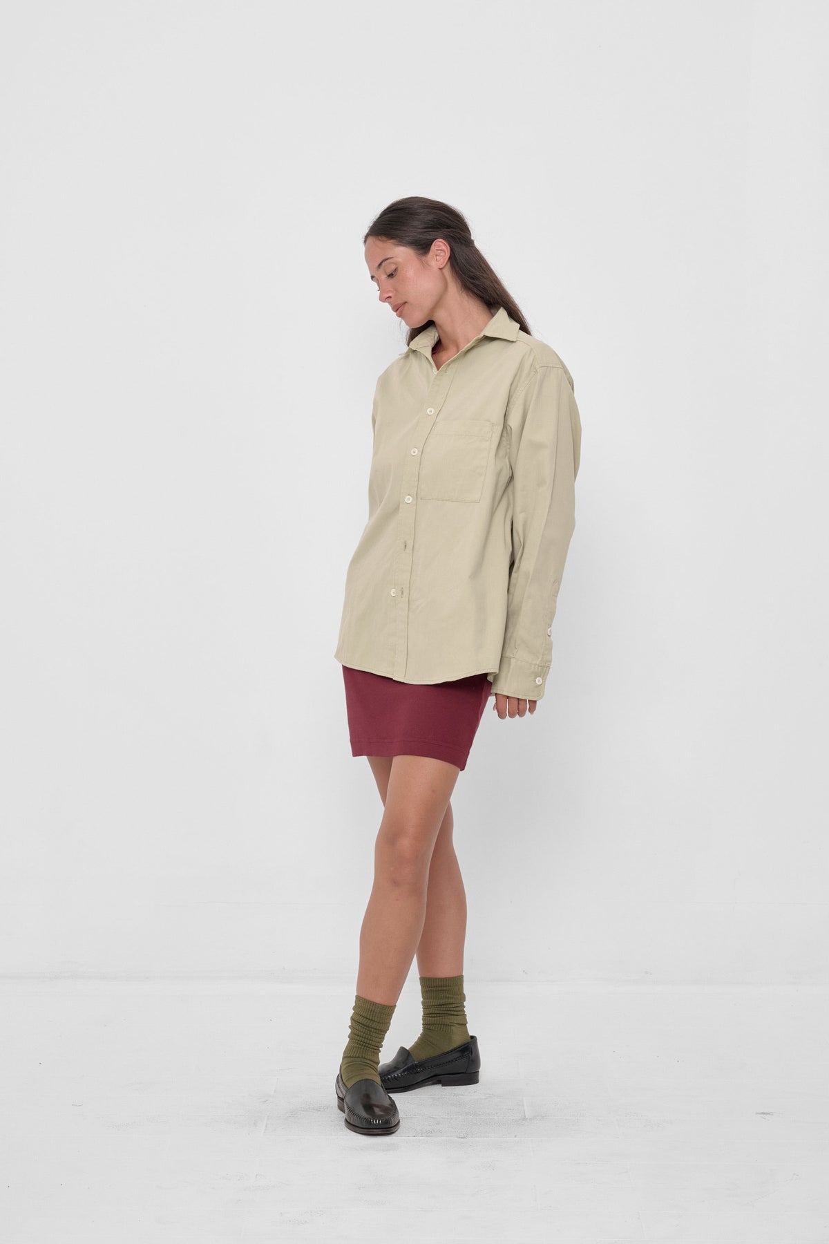 Peach Fuzz Button-Up Shirt in Oat – front full body view on model, worn over a Garnet Rib Dress