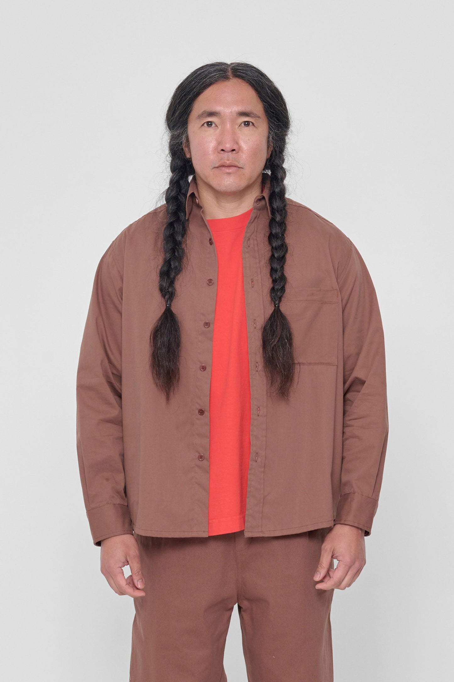 5'11" model wearing size XL Potting Soil Peach Fuzz Button Up Shirt. Bottom hem hits at mid-hip. 