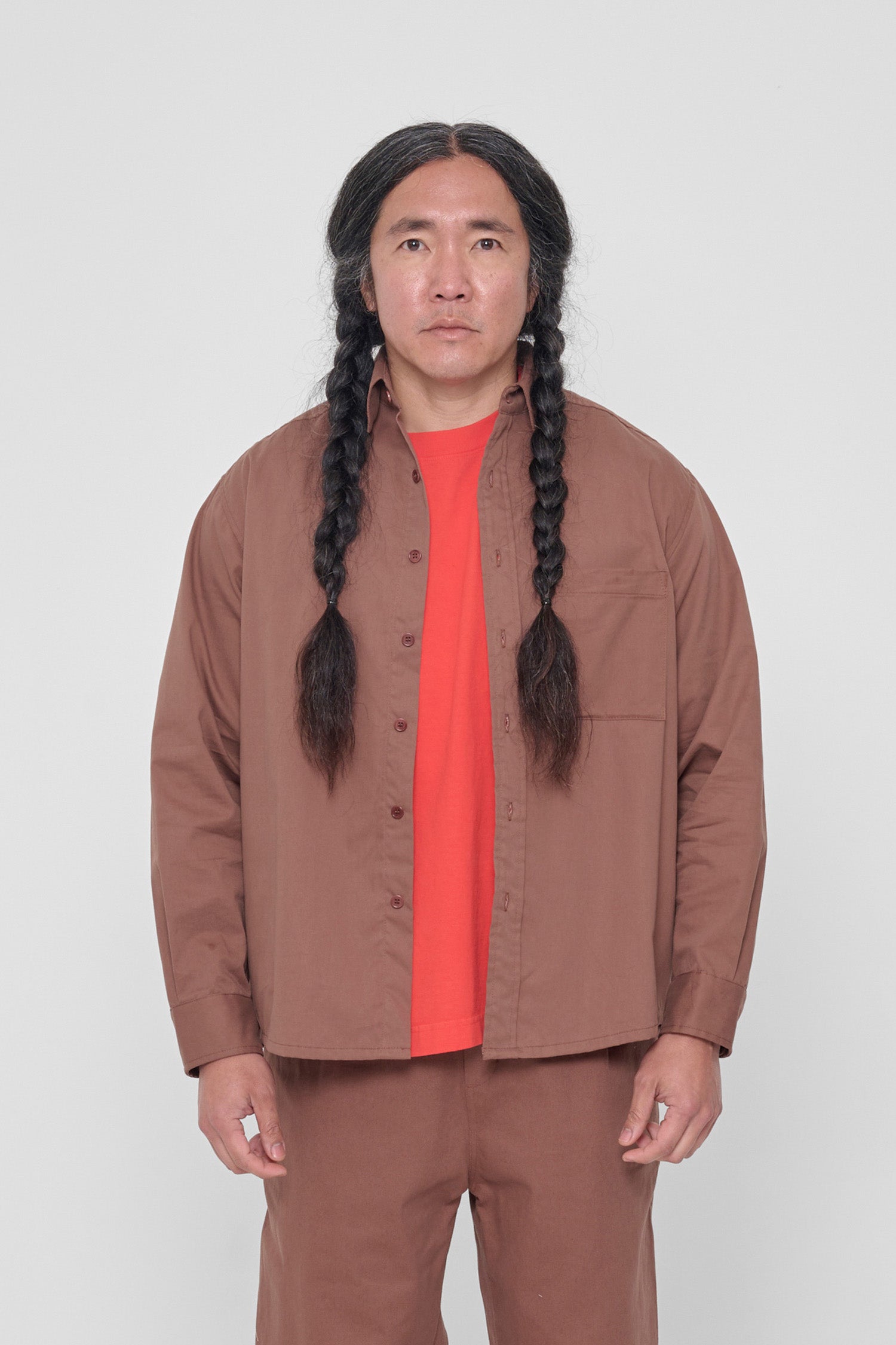 5'11" model wearing size XL Potting Soil Peach Fuzz Button Up Shirt. Bottom hem hits at mid-hip. 