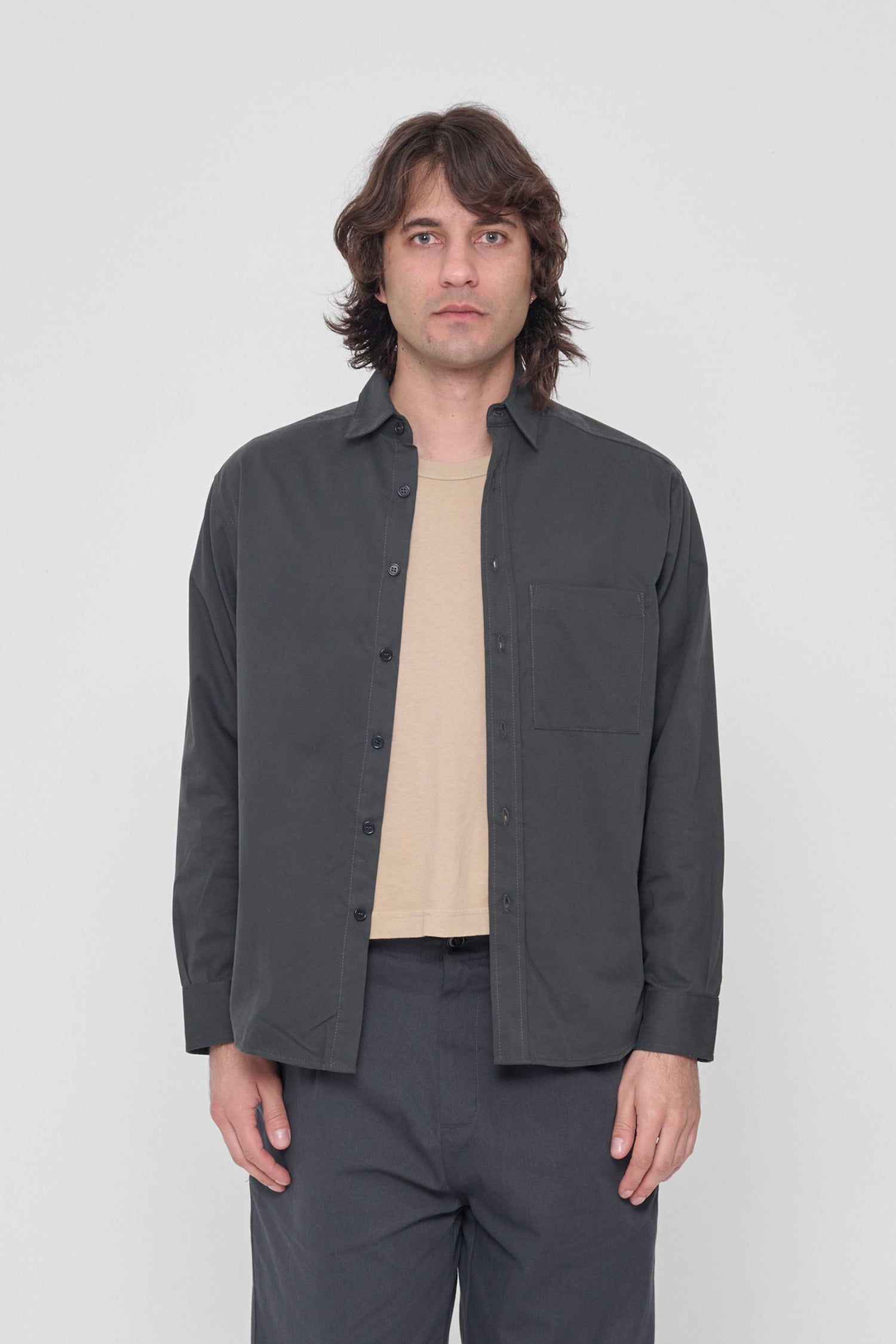 6'2" model wearing size L Slate Peach Fuzz Button Up Shirt. Bottom hem hits at mid-hip. 