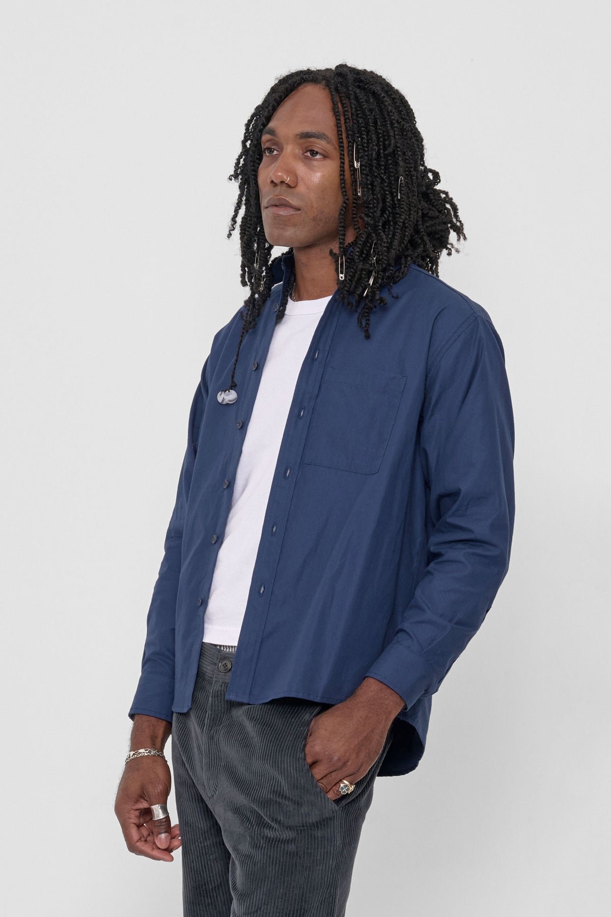 Peach Fuzz Button-Up Shirt in Washed Navy – 3/4 front view on model