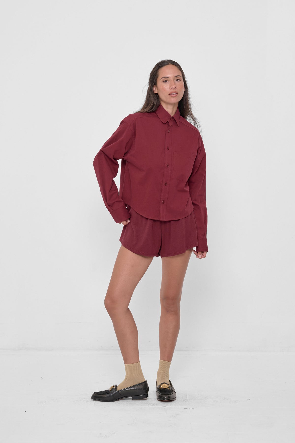 Peach Fuzz Cropped Button-Up Shirt in Garnet – 3/4 front view, styled with matching Tubular Shorts
