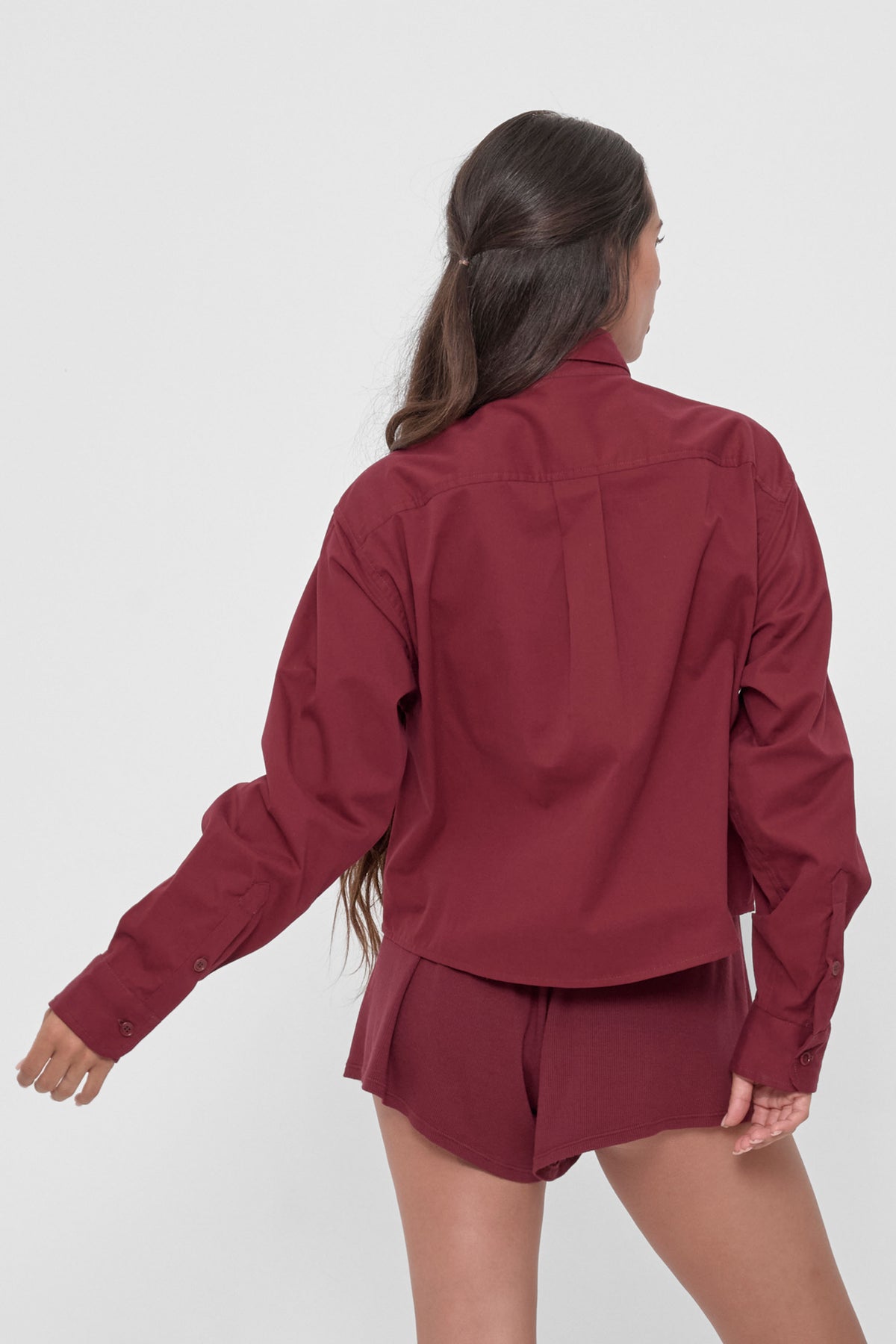 Peach Fuzz Cropped Button-Up Shirt in Garnet – back view on model