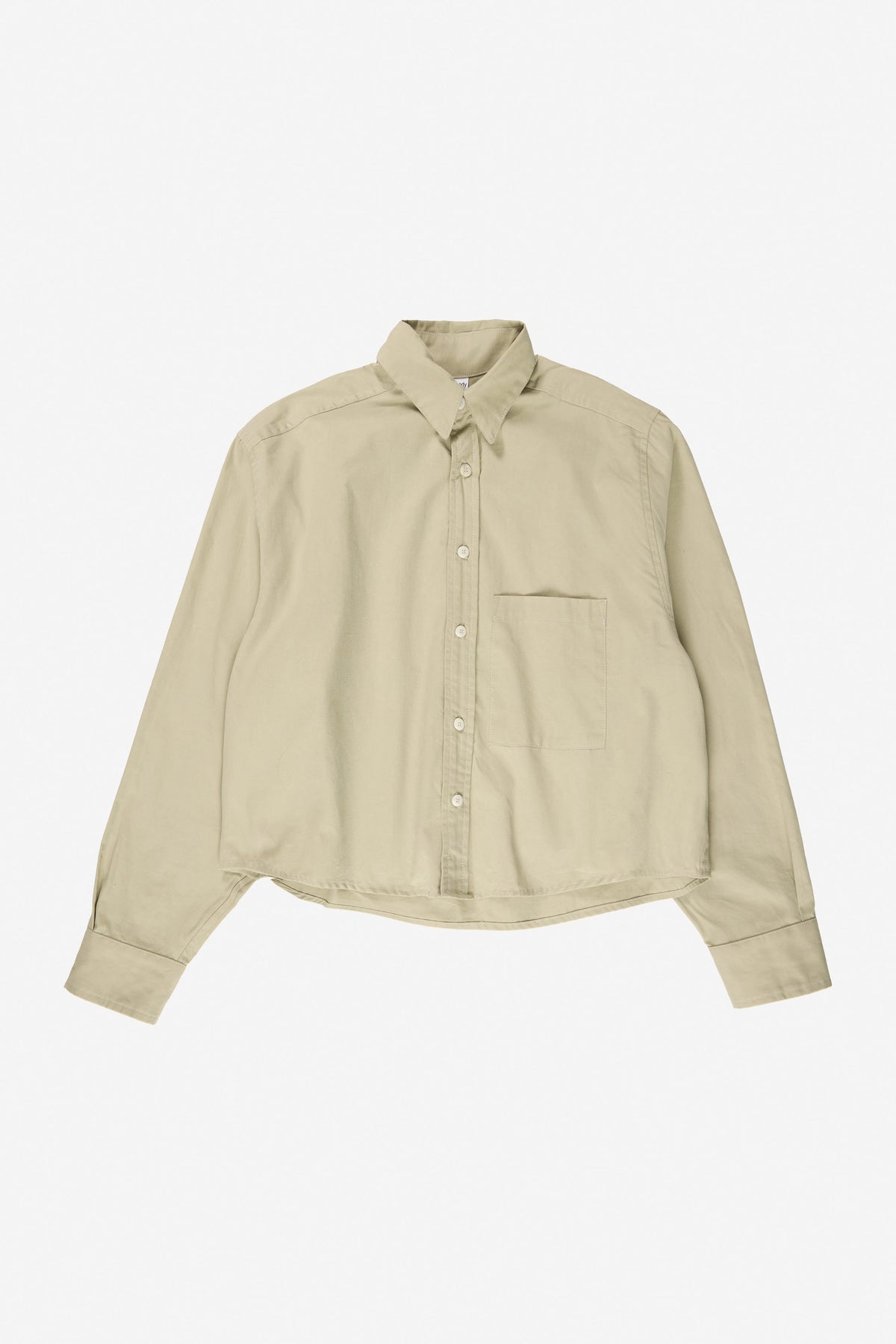 Peach Fuzz Cropped Button-Up Shirt in Oat – flat lay front view, no model