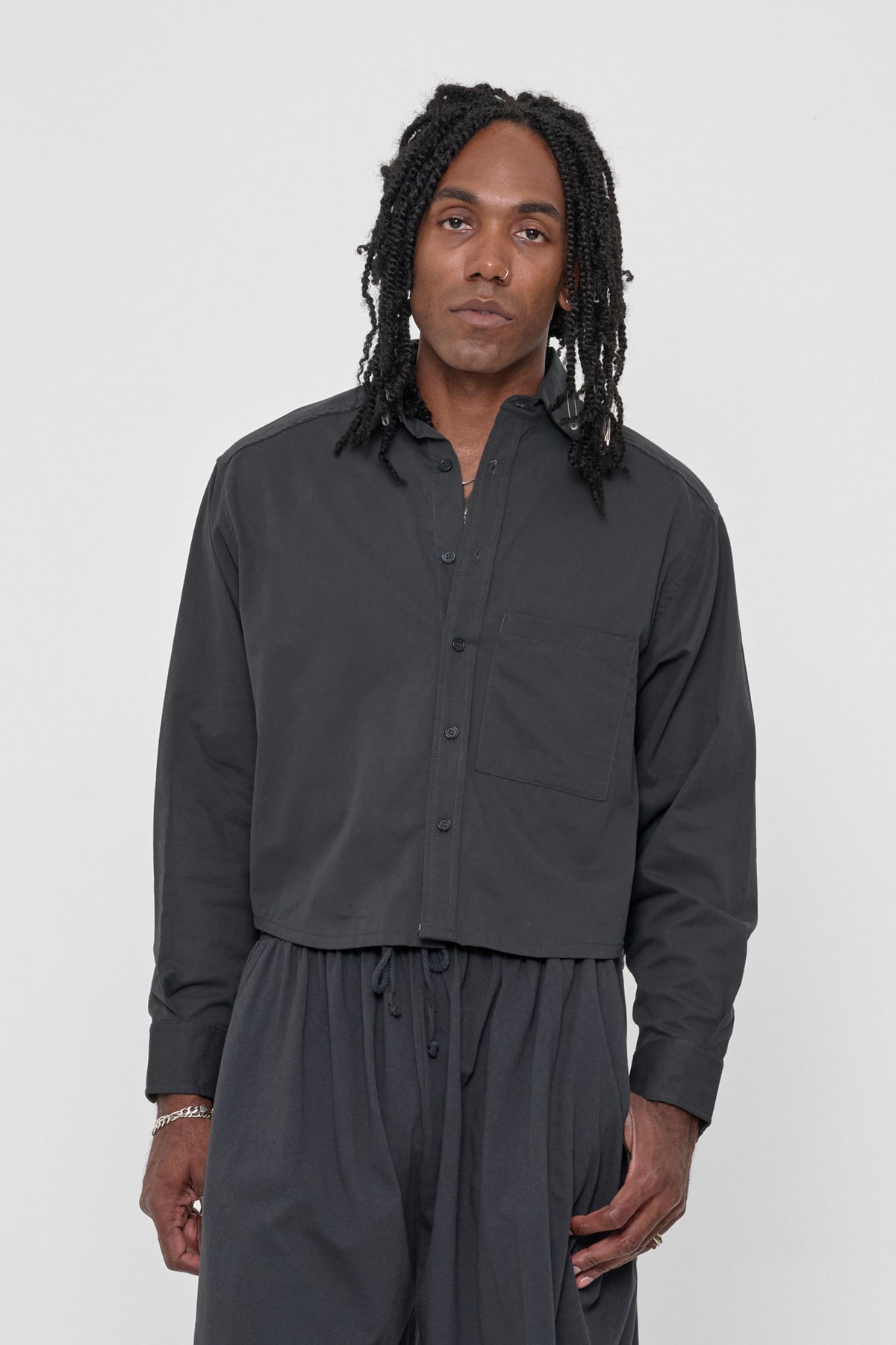 Peach Fuzz Cropped Button-Up Shirt in Slate – front view on model