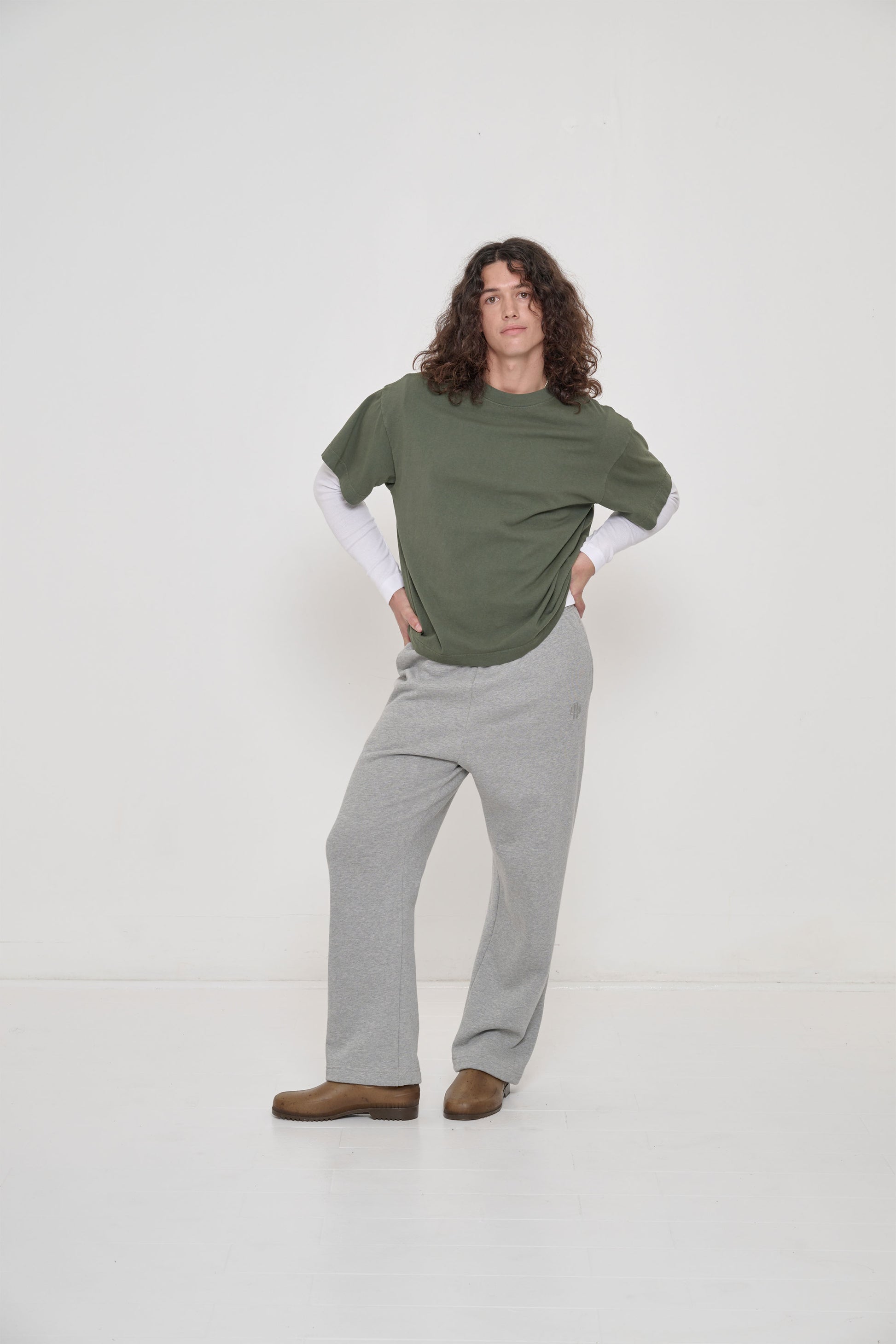 Model wearing Hemp Plasticana Gardana Clogs with Heather Sweatpants.