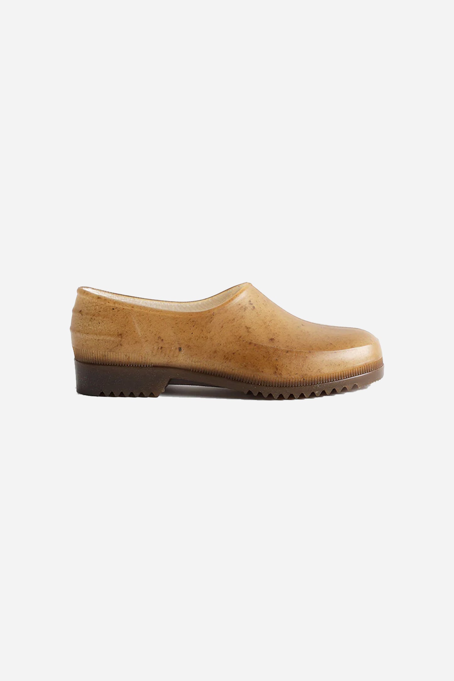 Side view of Hemp Plasticana Gardana Clogs showing tread and semi translucent hemp texture.