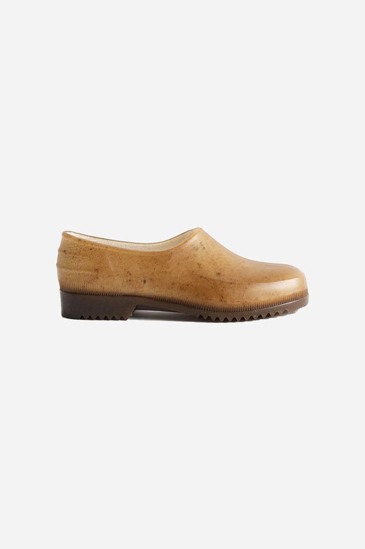 Side view of Hemp Plasticana Gardana Clogs showing tread and semi translucent hemp texture.