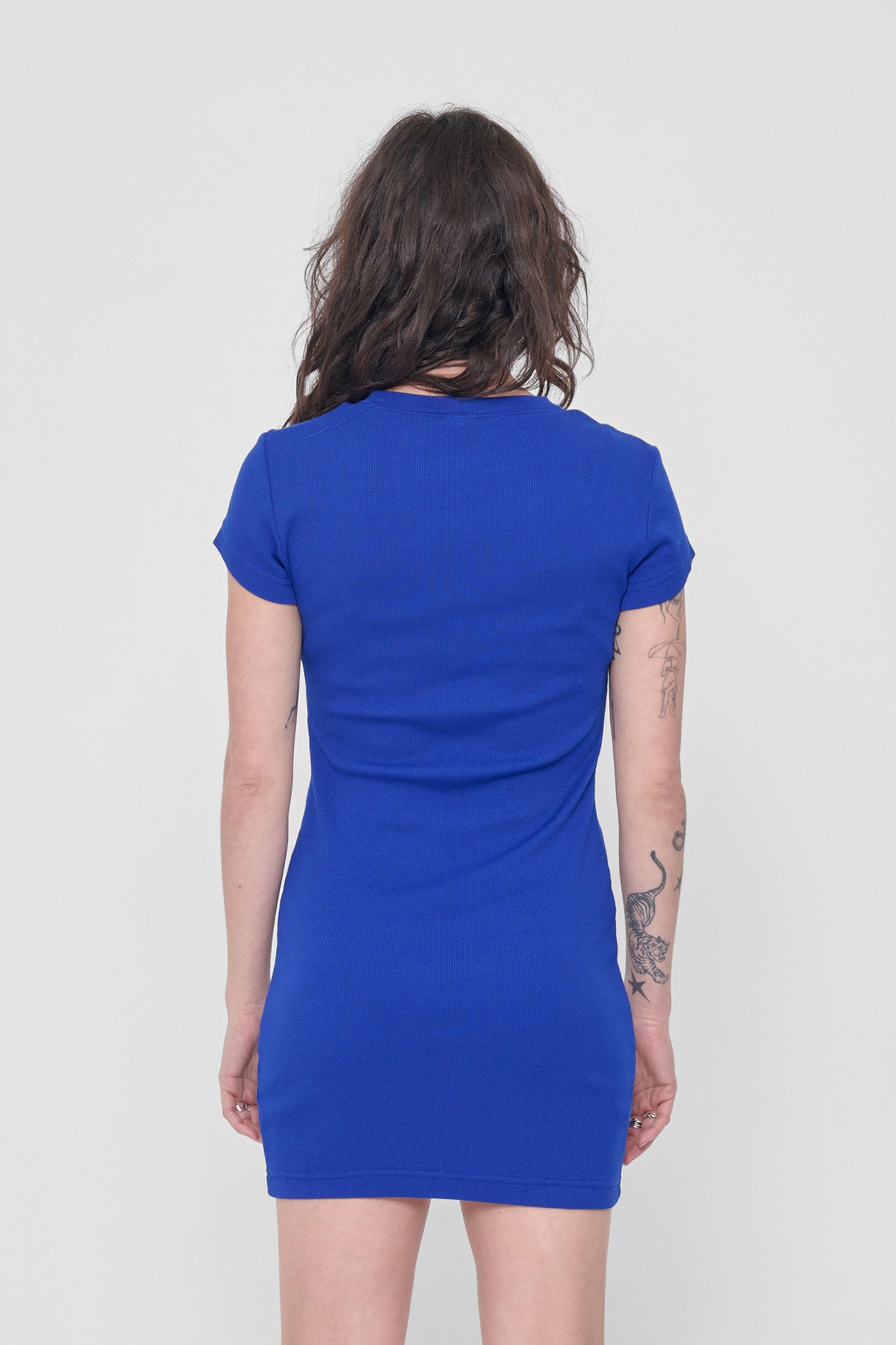 Back view showing the formfitting silhouette.