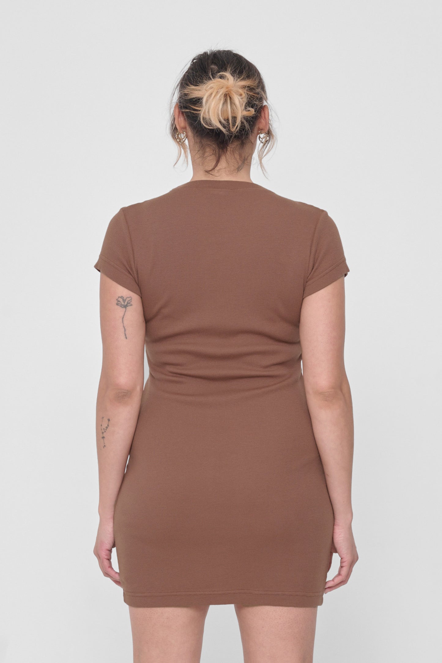 Back view showing the formfitting silhouette.