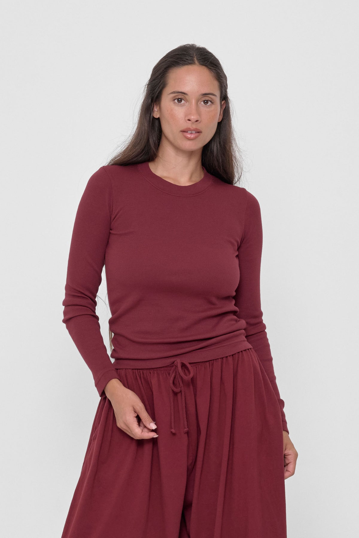 Rib Long Sleeve in Garnet – front view on model