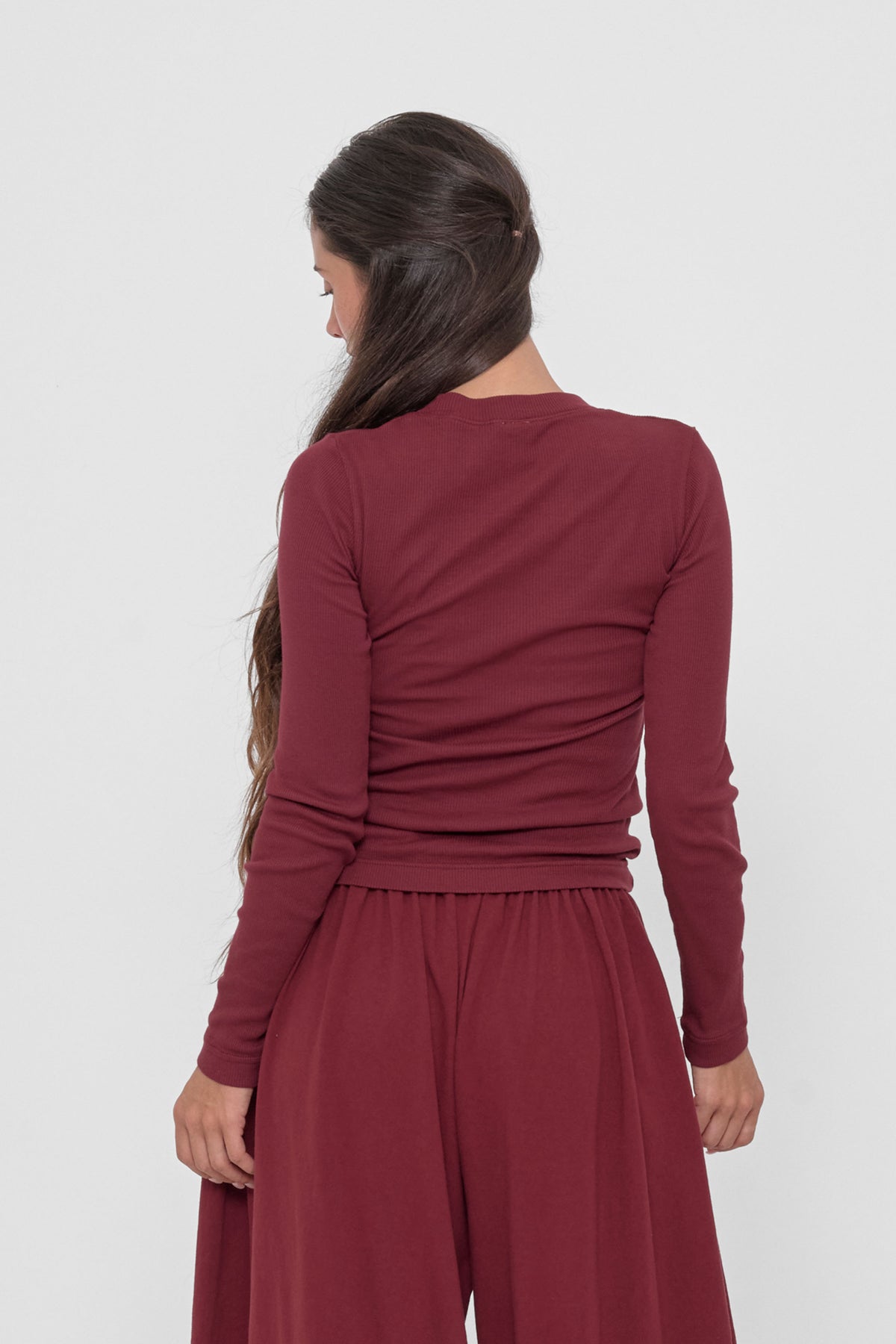 Rib Long Sleeve in Garnet – back view on model