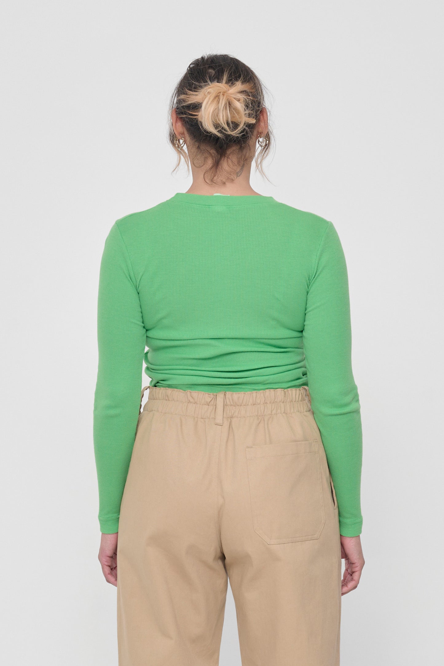 Back view: Fitted across upper back and scrunched up across mid to lower back.