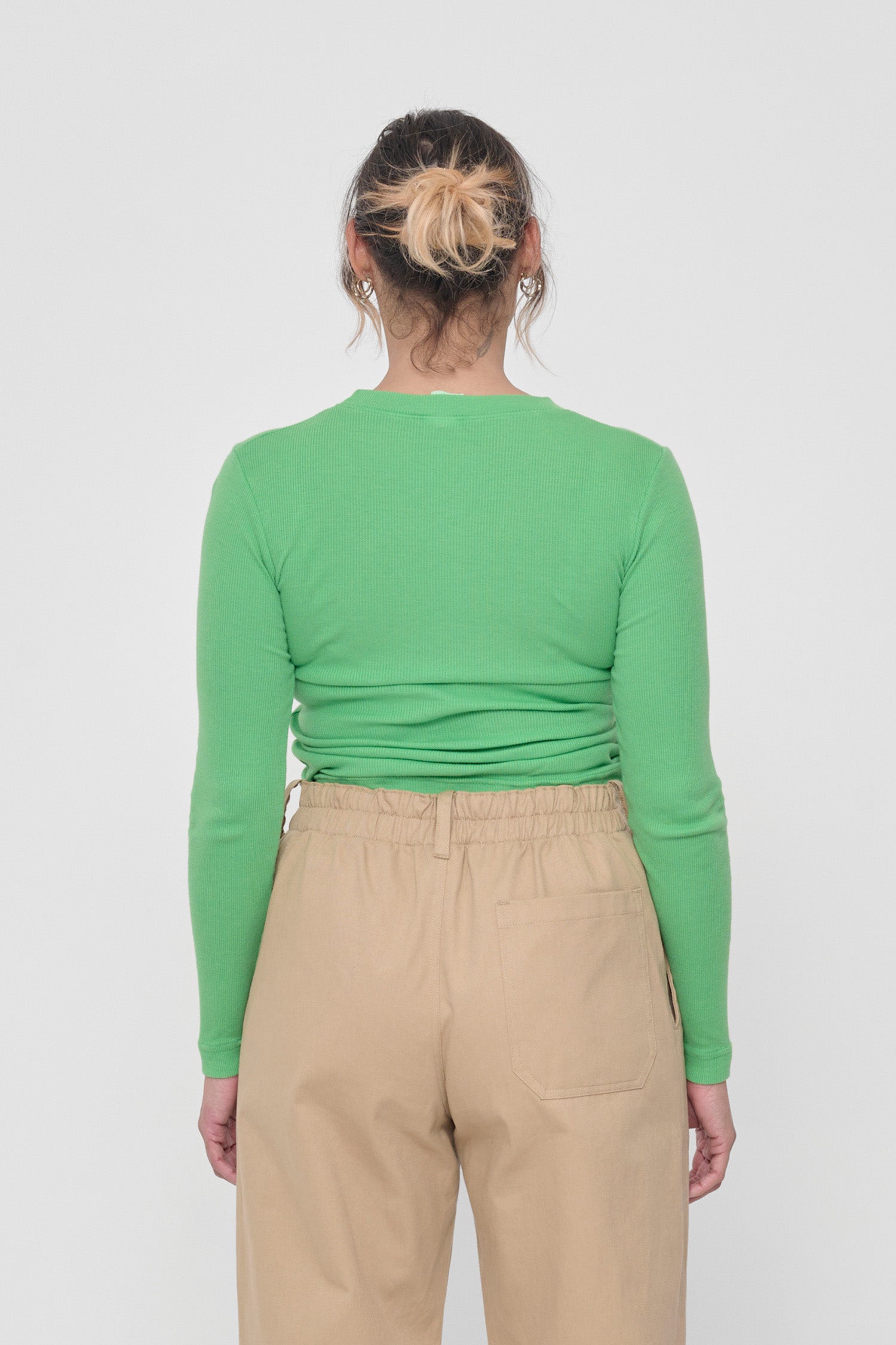 Back view: Fitted across upper back and scrunched up across mid to lower back.