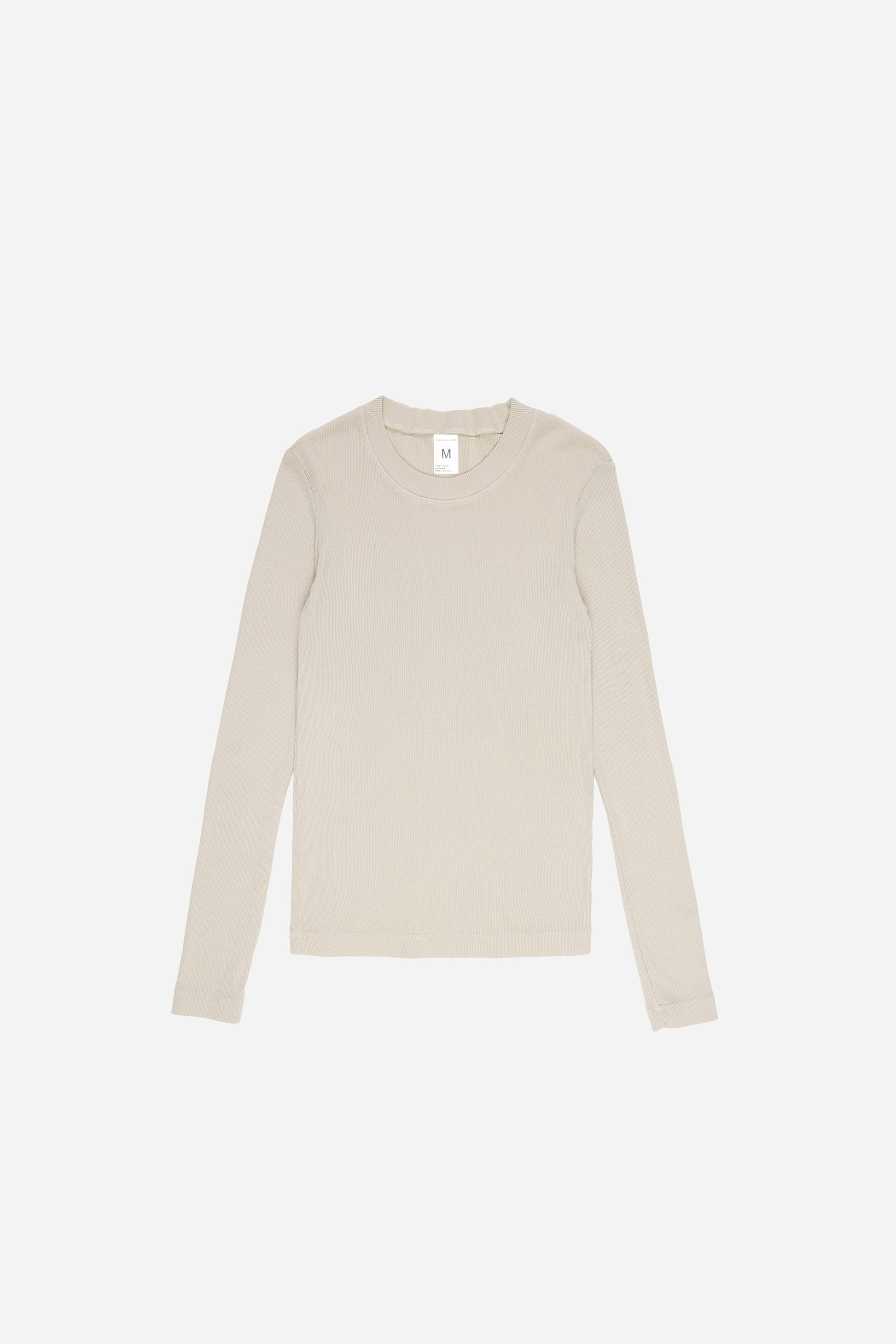 Flat lay of the Rib Long Sleeve in Oat, showing the full length and long sleeves.