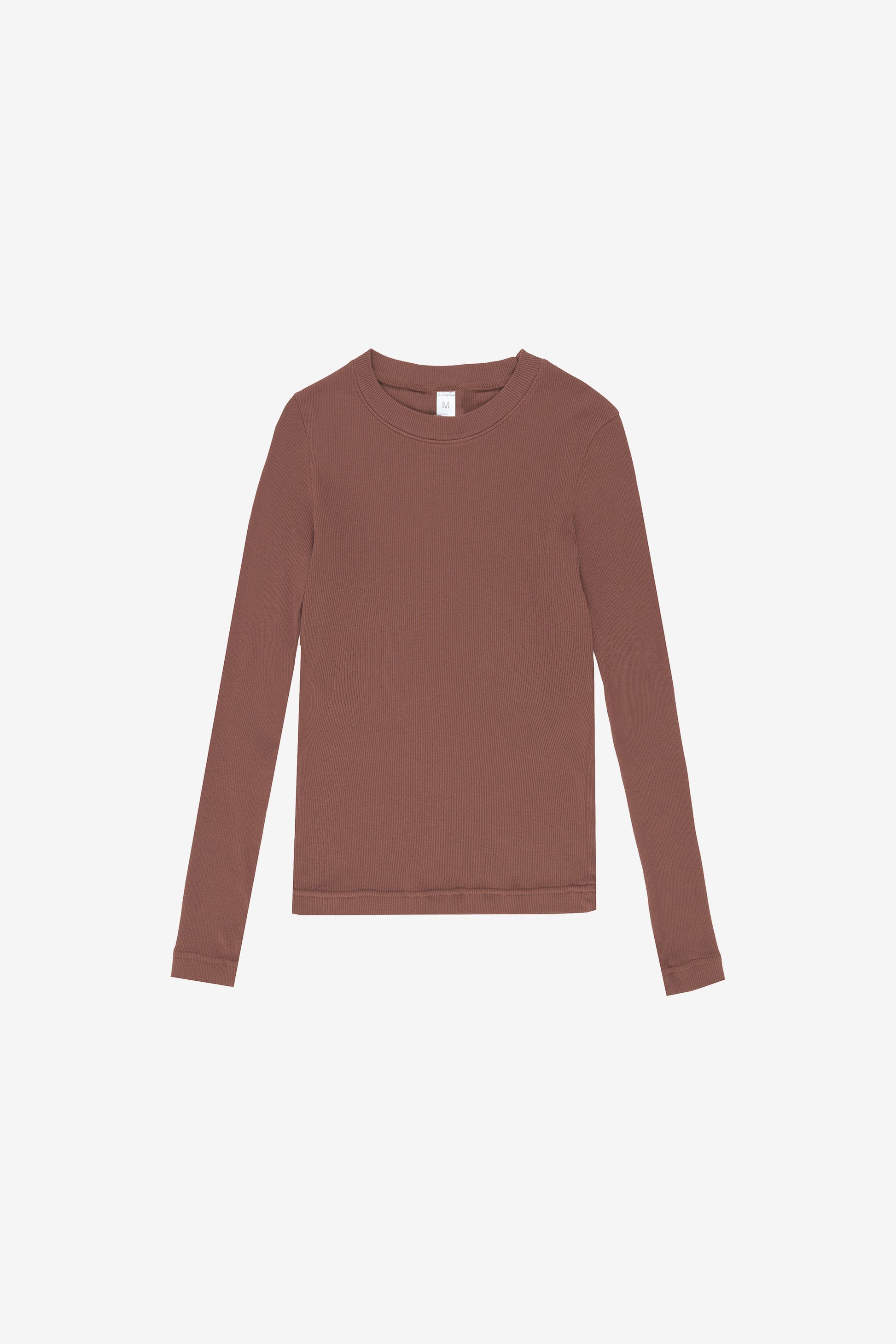 Flat lay, revealing the shirt’s slim, straight, and unstretched form.