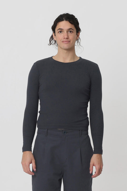 6' person in a size M Slate Rib Long Sleeve. Hem ends above their hip bones.