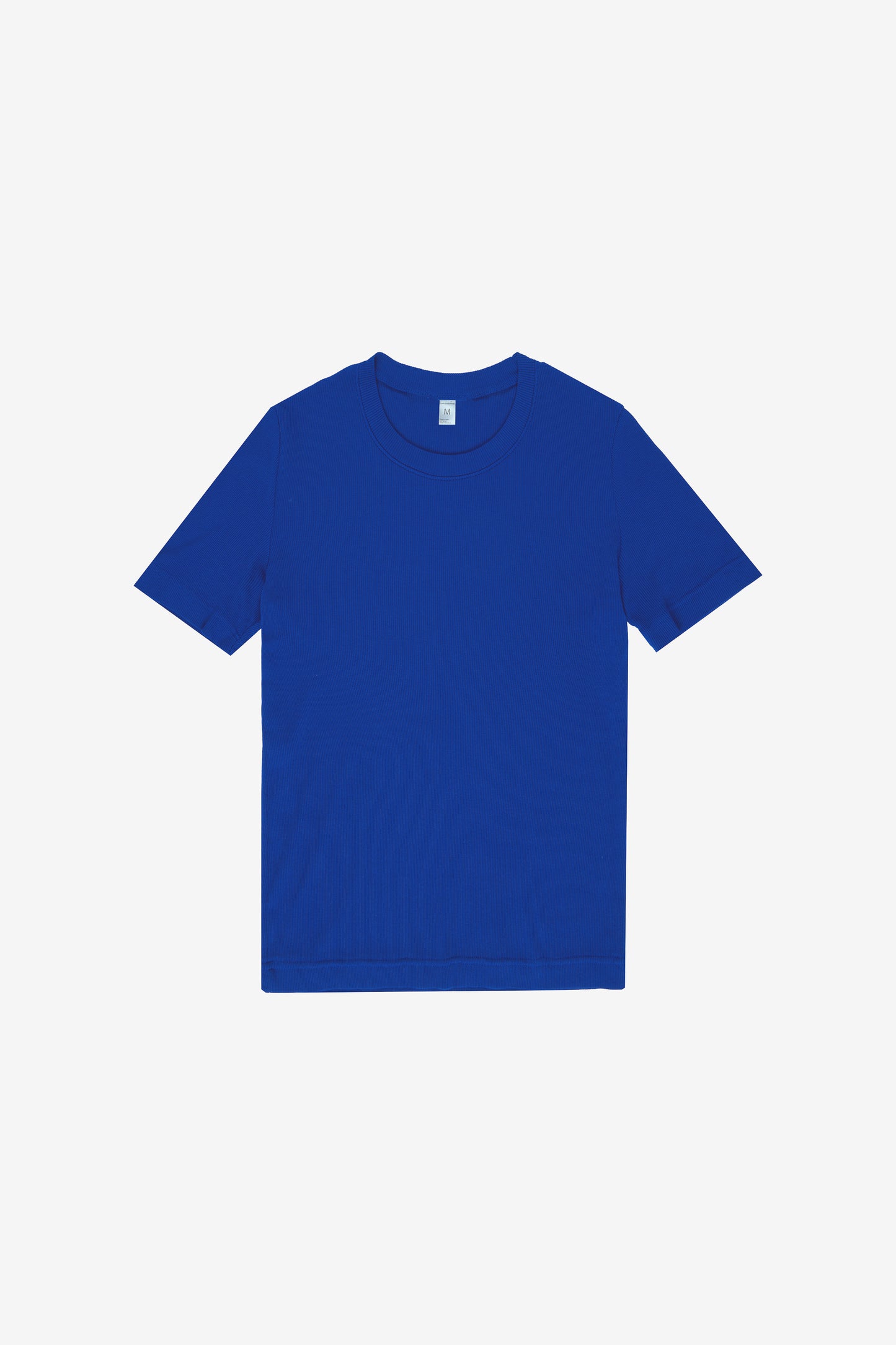 Flat lay showing slim and rectangular torso and sleeve silhouettes.