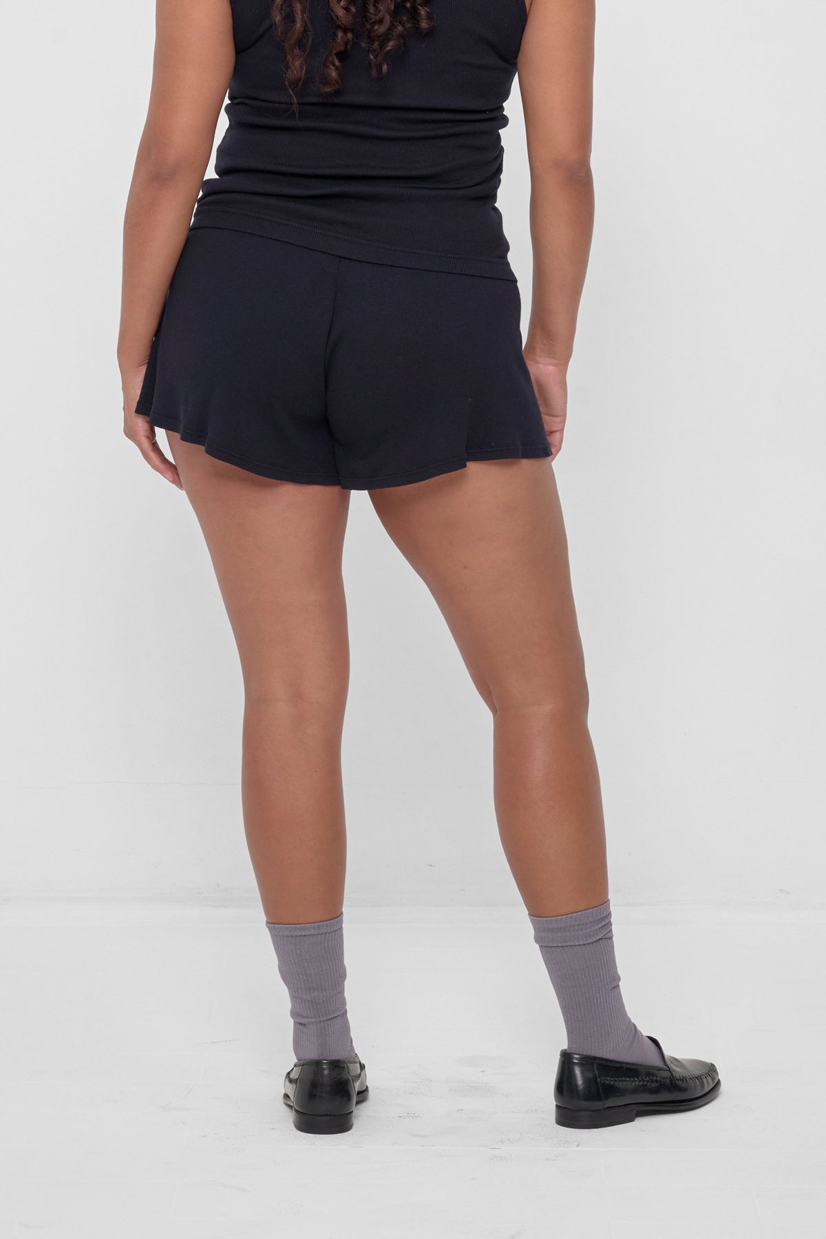 Rib Shorts in Black – back view on model