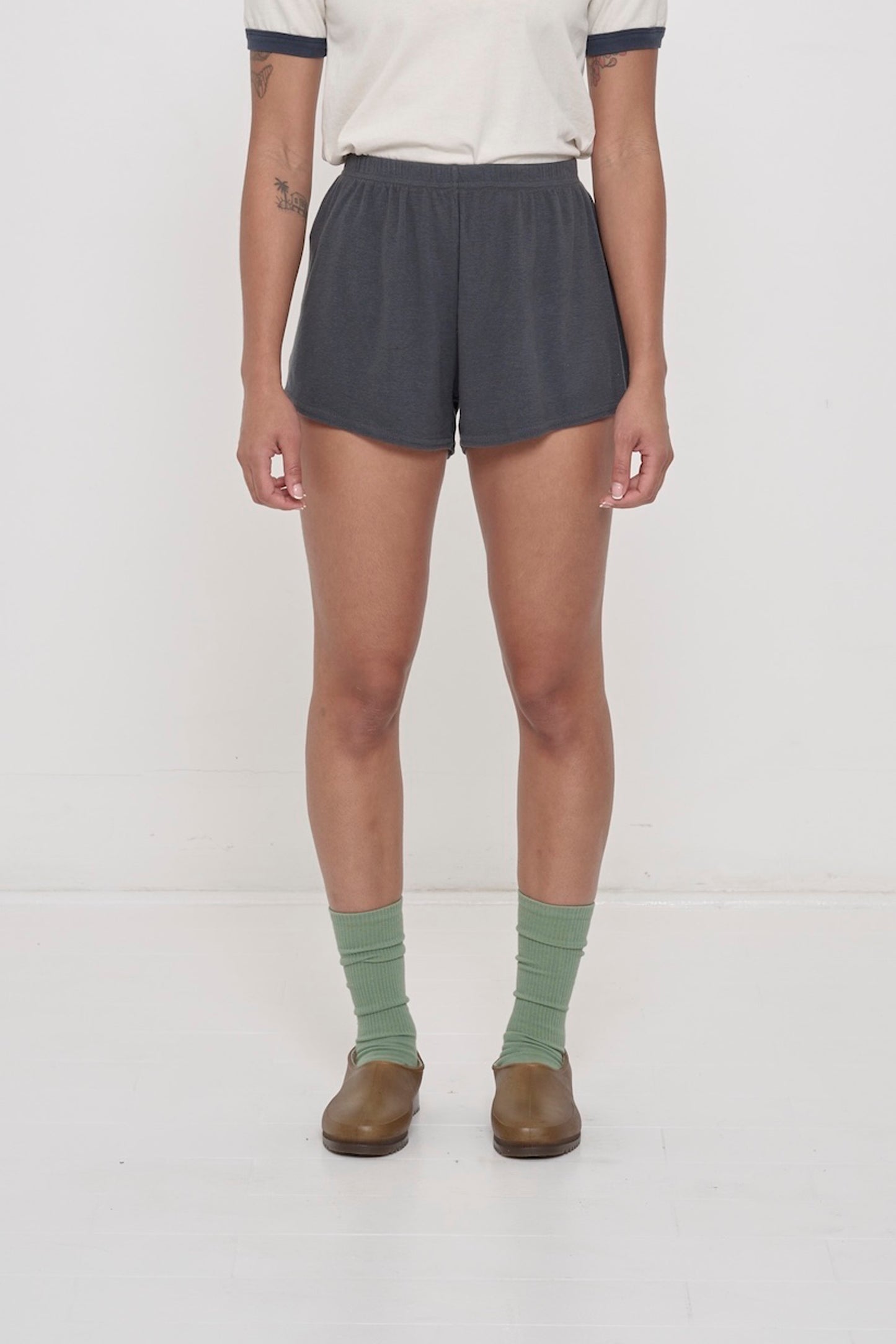 Slate Rib Shorts on model, front. Relaxed fit, upper-thigh length and elastic waist.