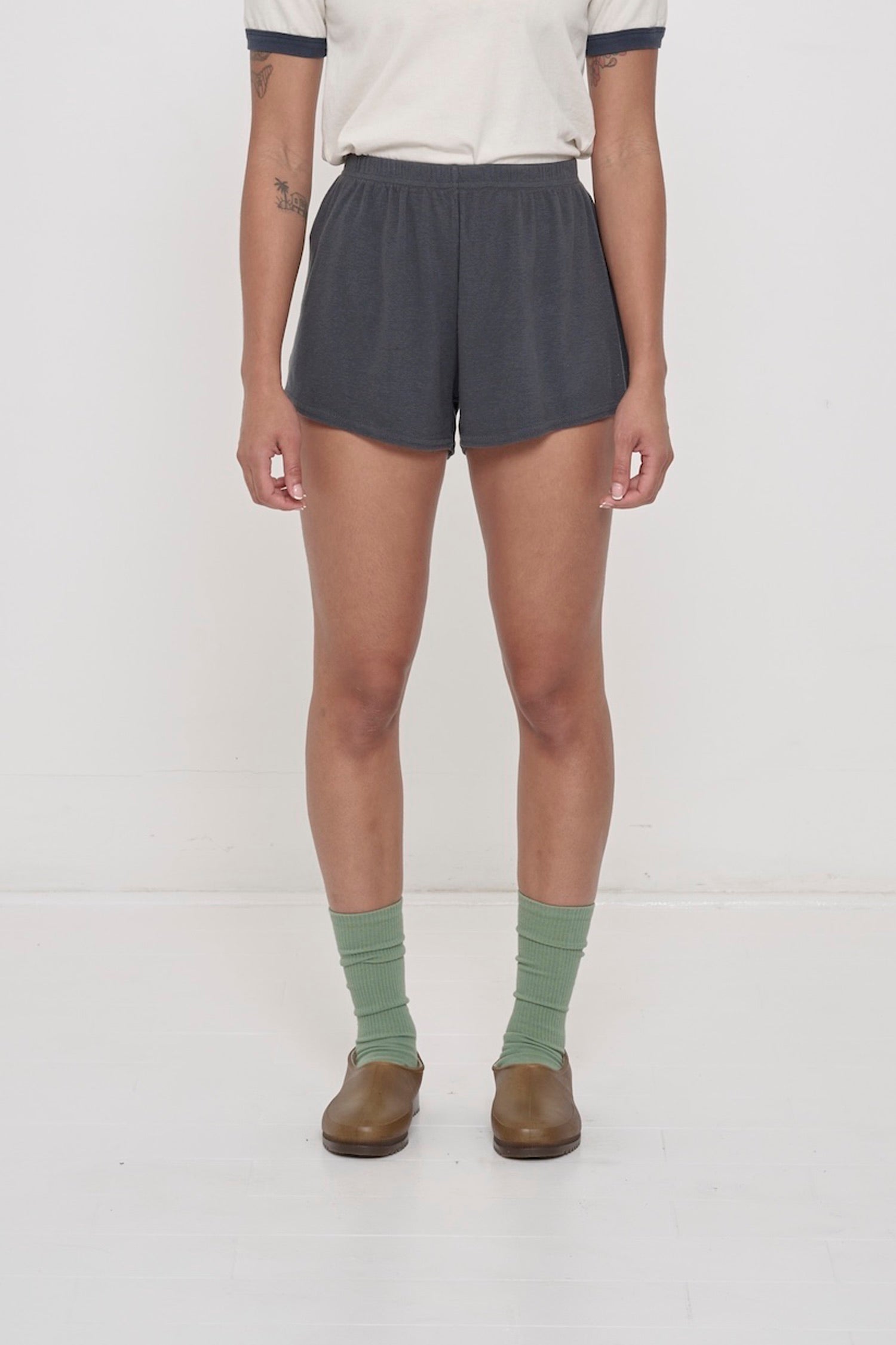Slate Rib Shorts on model, front. Relaxed fit, upper-thigh length and elastic waist.
