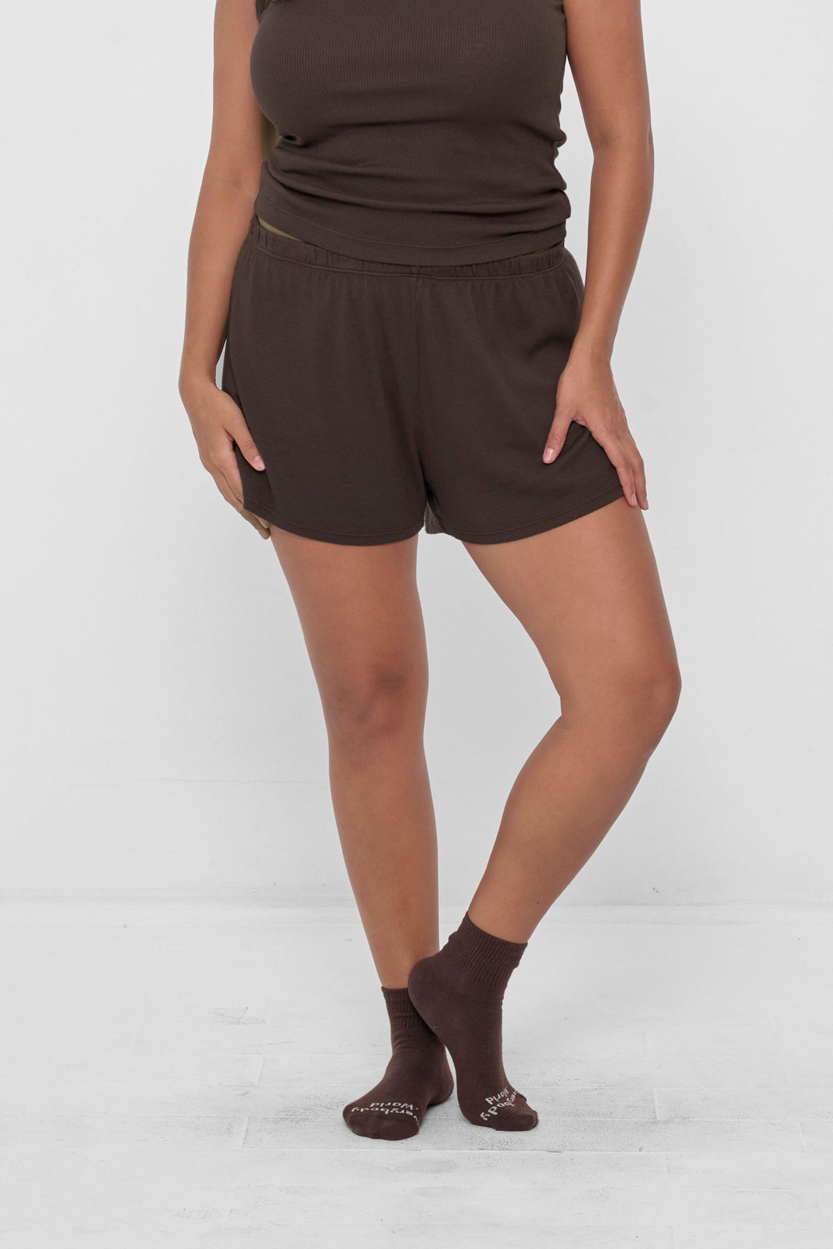 Rib Shorts in Wet Soil – front view on model