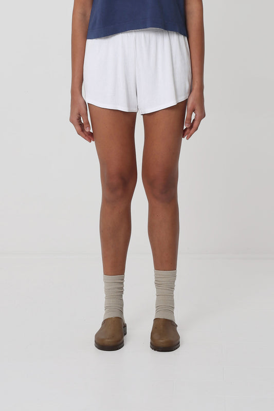 S White Rib Shorts on 5'10" model. Relaxed fit, upper-thigh length.