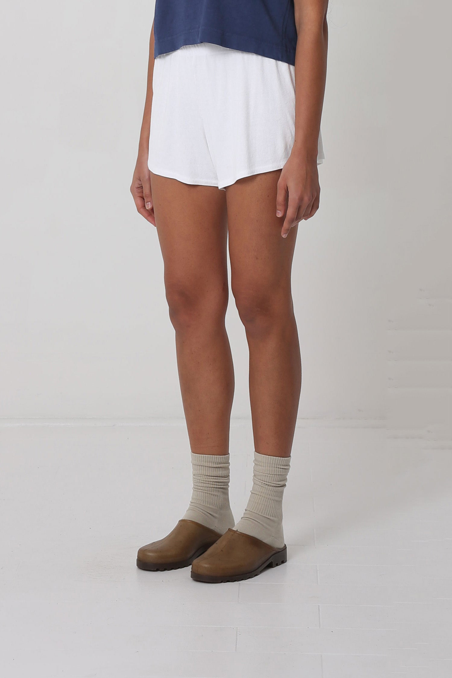 A person facing 45-degrees, showcasing spacious leg openings.