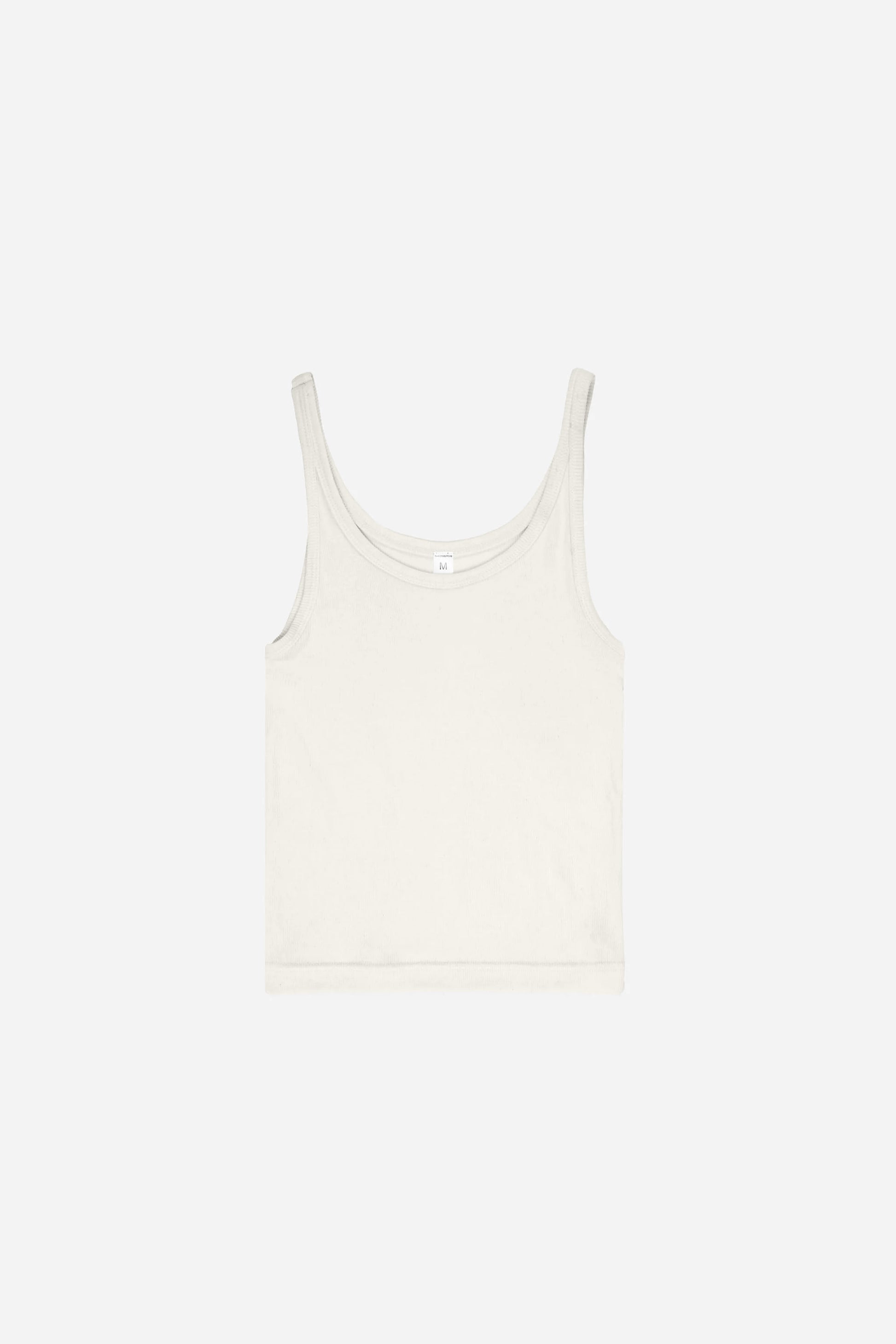 Flat lay showing the rectangular and semi-cropped torso shape.