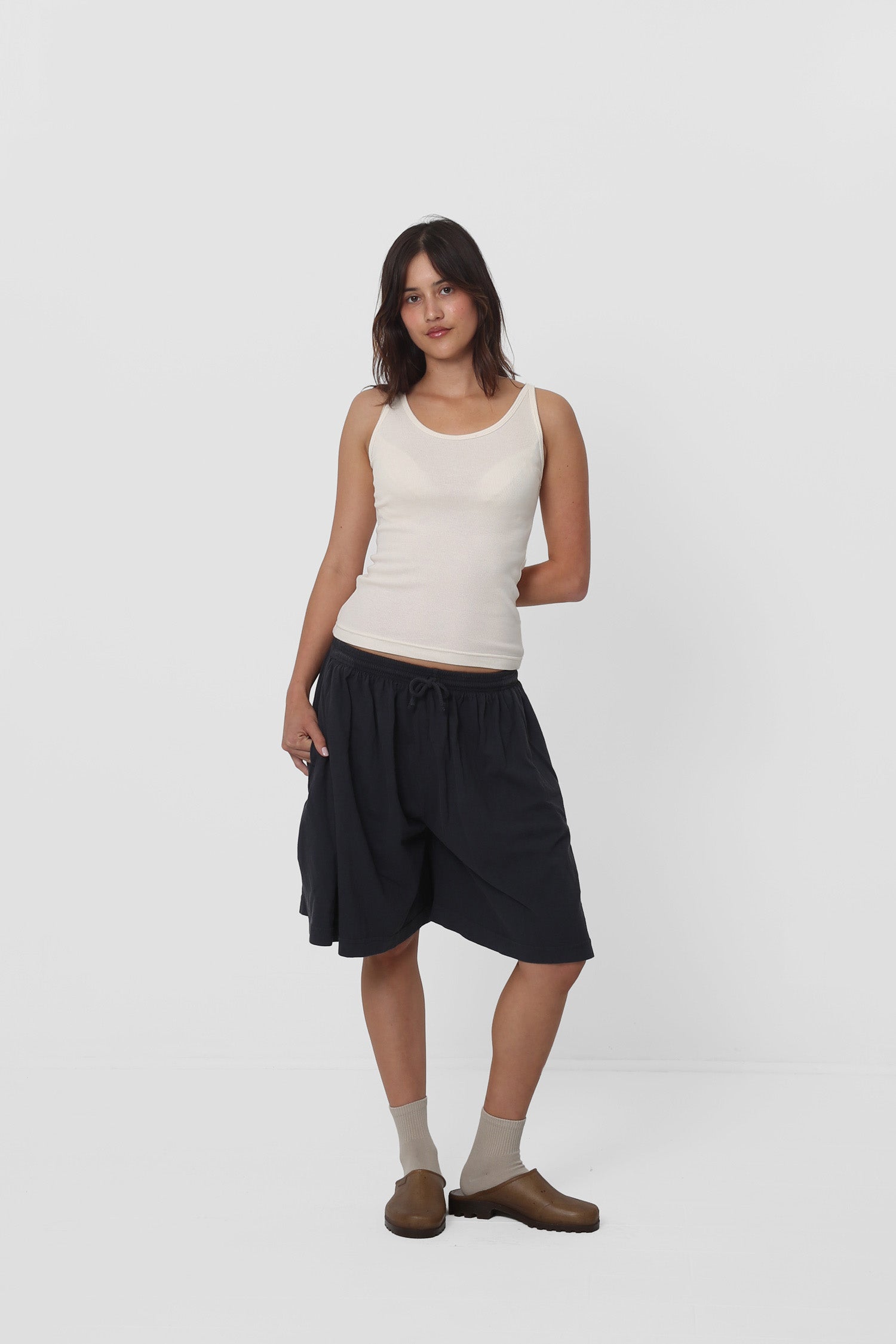 Styled with Slate Long Tubular Shorts, Oat Spring Socks and Plasticana clogs.