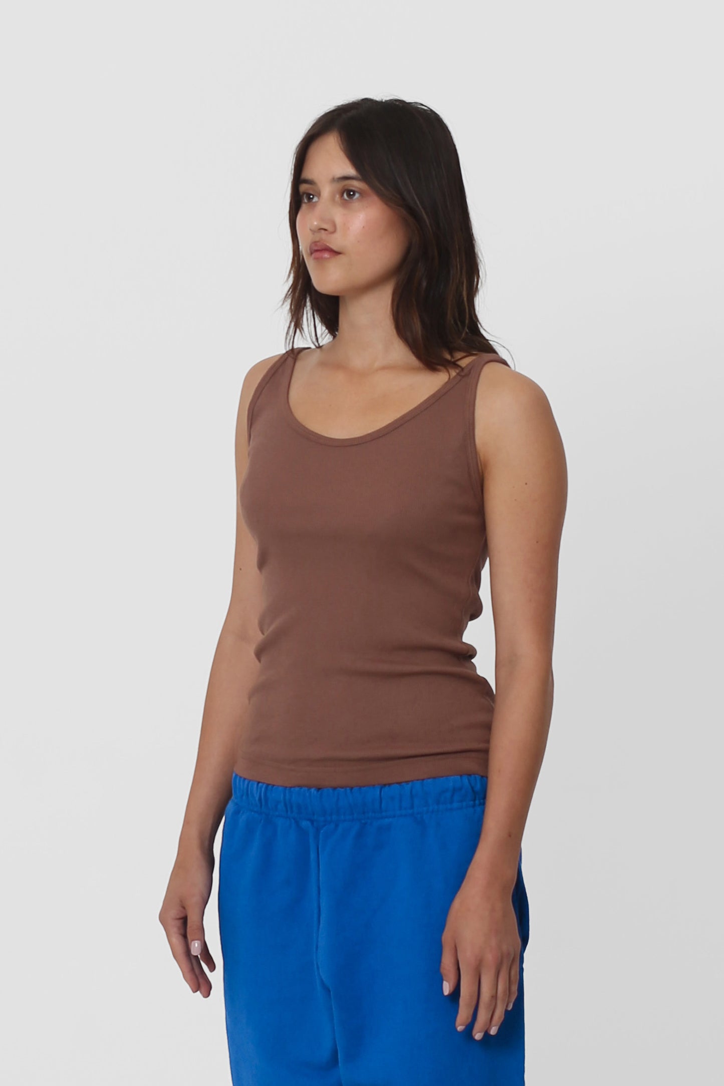 3/4 front view showcasing side seams and fitted silhouette.