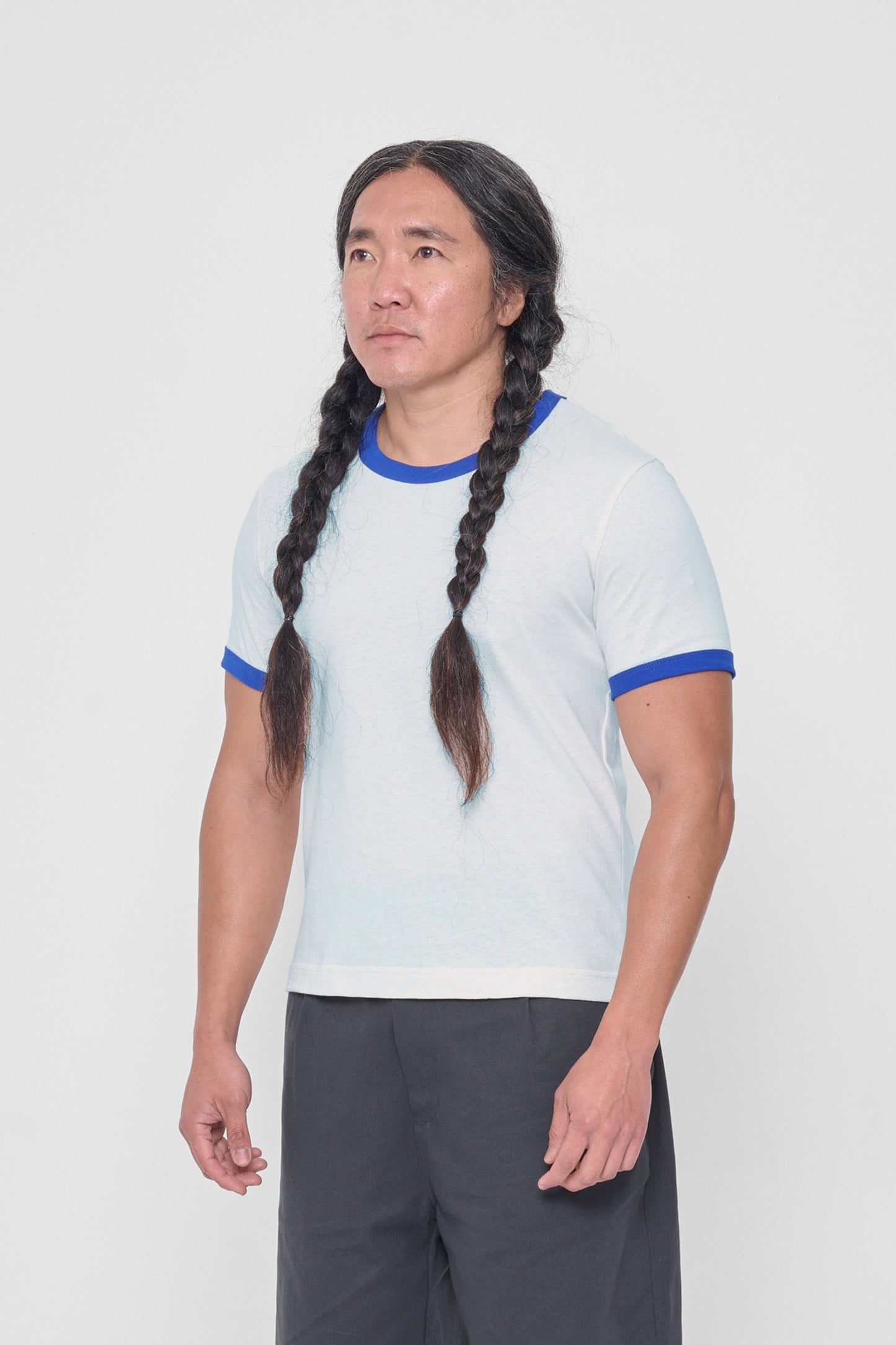 3/4 front view showing the side seams and slim fit.