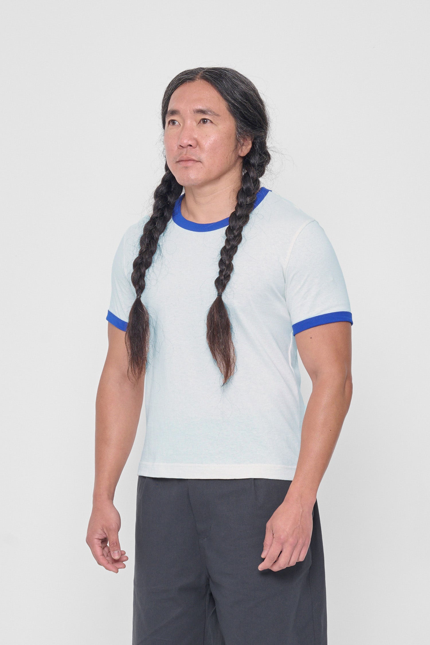 3/4 front view showing the side seams and slim fit.