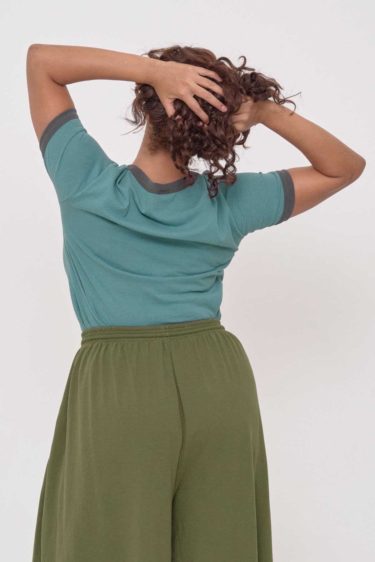Ringer Trash Tee in Oyster – back view on model