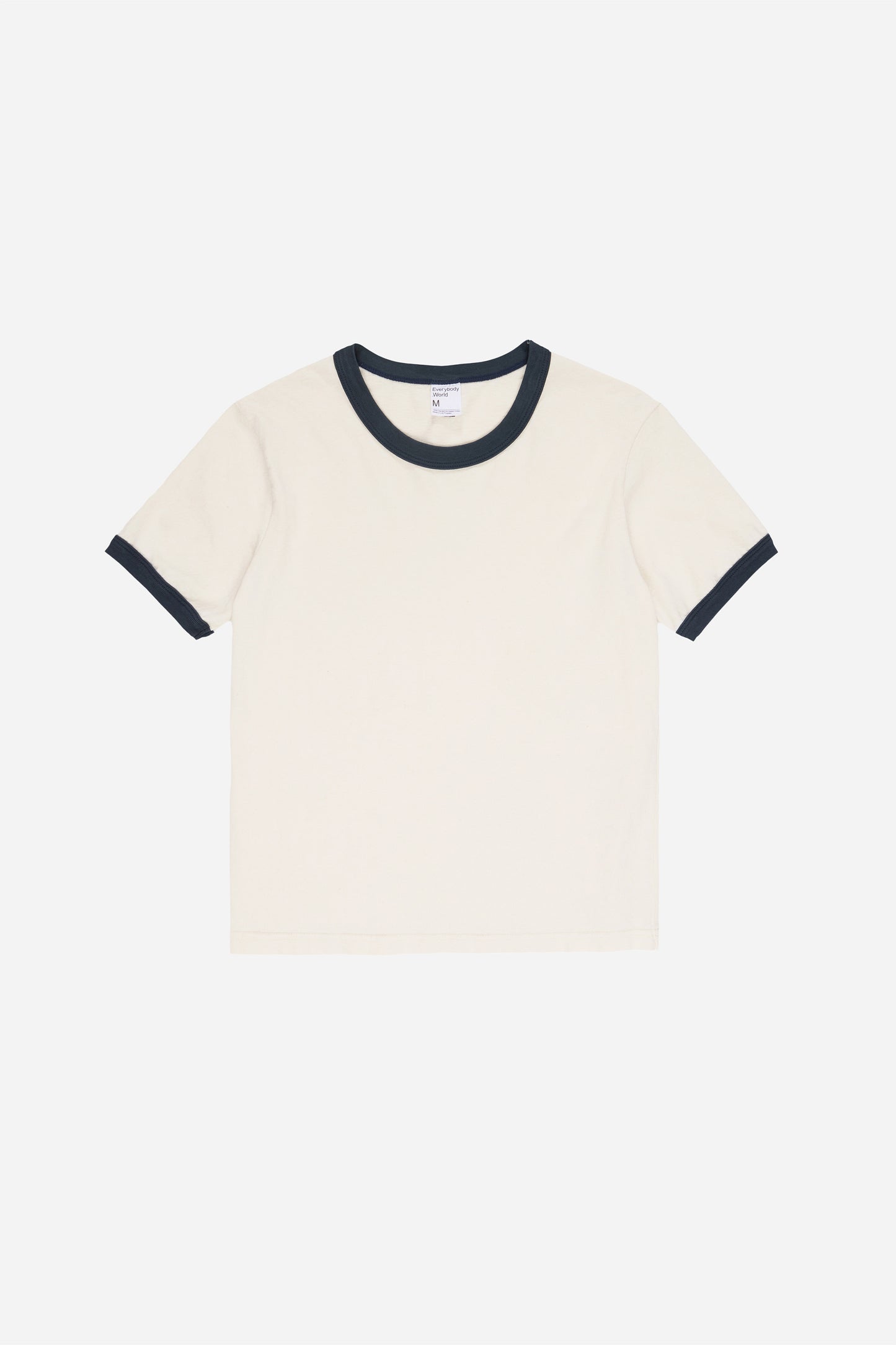 Flat lay of the Ringer Trash Tee in Slate, showing the front of the tee with contrasting trim.