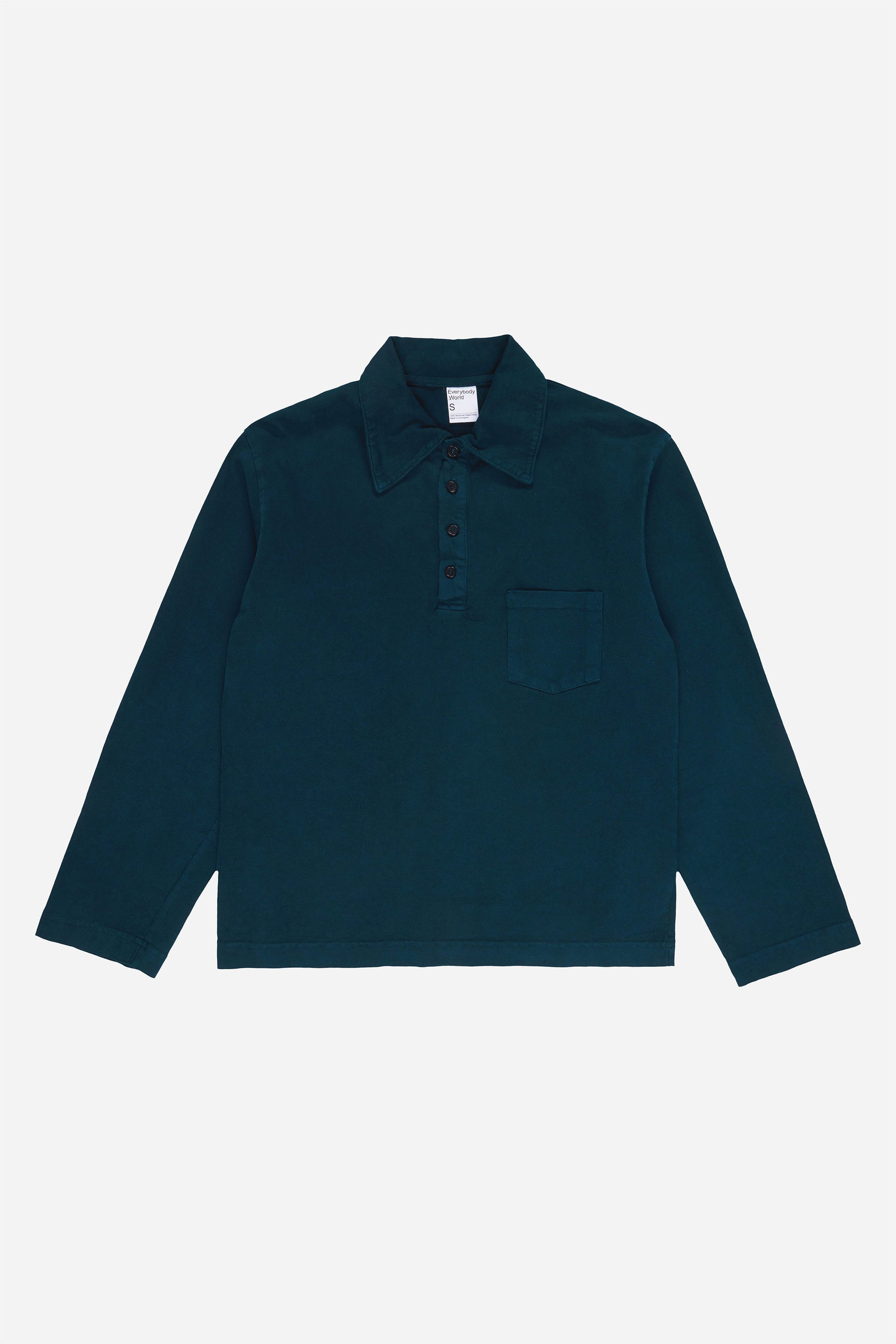 Flat lay of the Juniper Rugby Trash Polo, showing color, buttons, and front pocket.