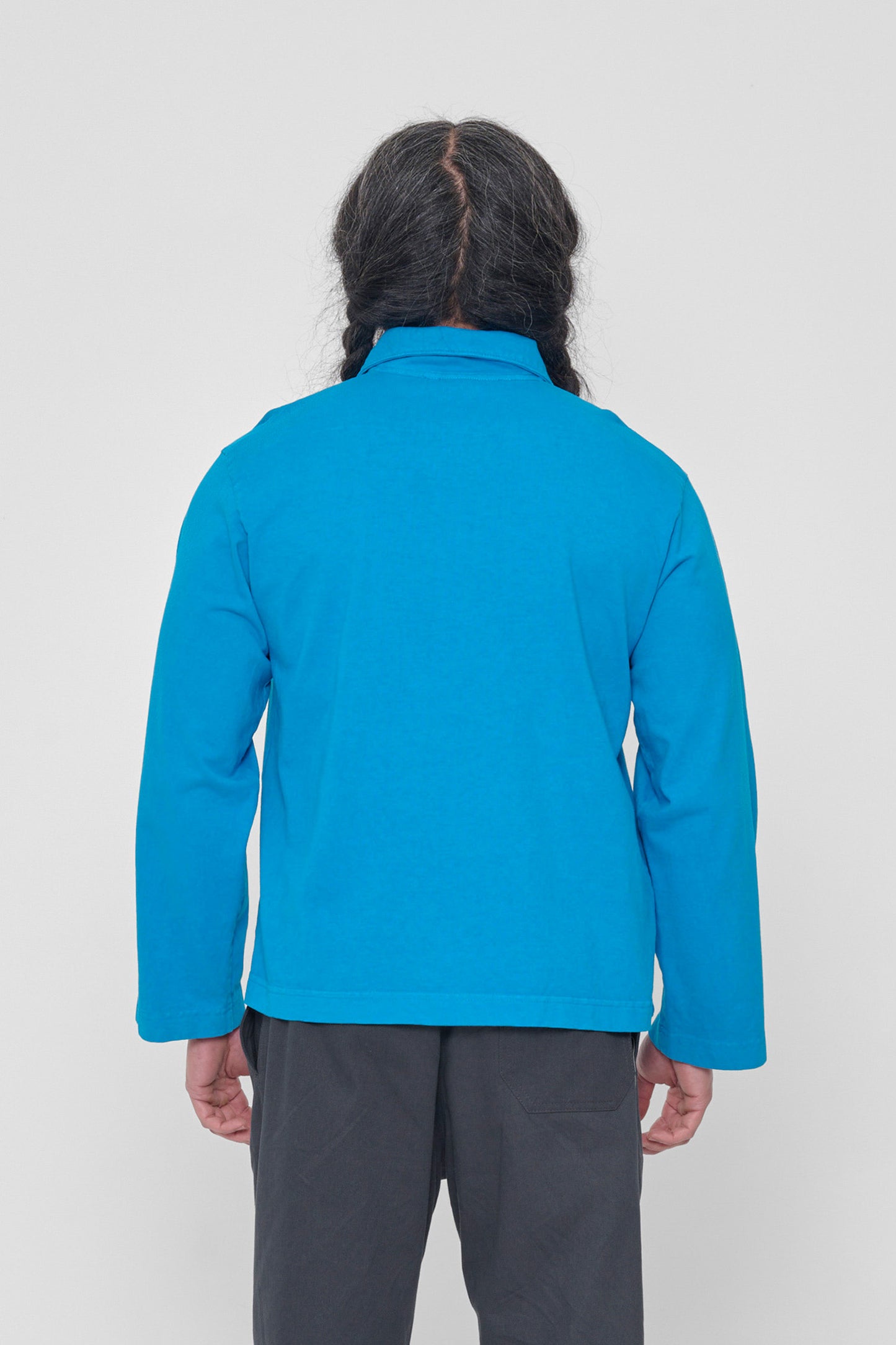 Back view: slightly fitted across upper back with more ease at mid and lower back.