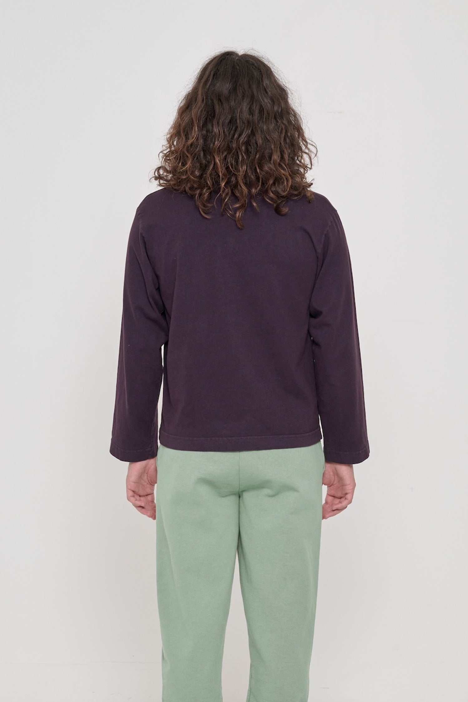 Mulberry Rugby Trash Polo, back view on a person. Boxy fit.