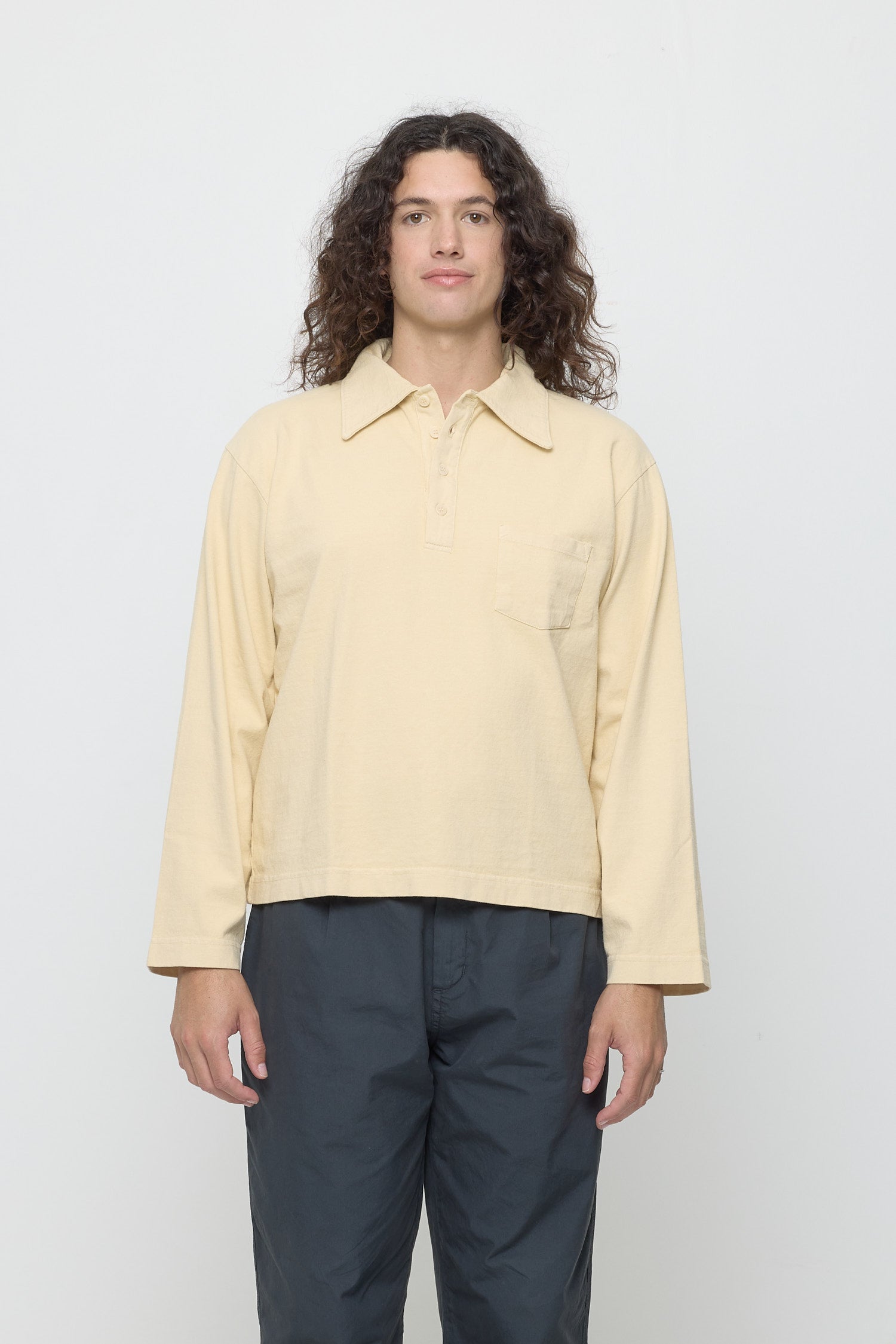 A 6' person wearing a size S Rugby Trash Polo in Turtle Dove. Hem hits mid-hip.