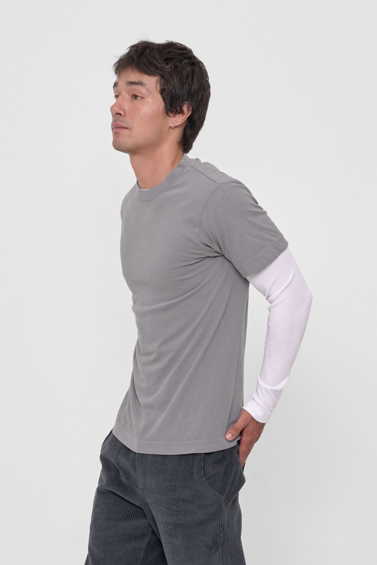 Short Sleeve Trash Tee in Stone – side view on model